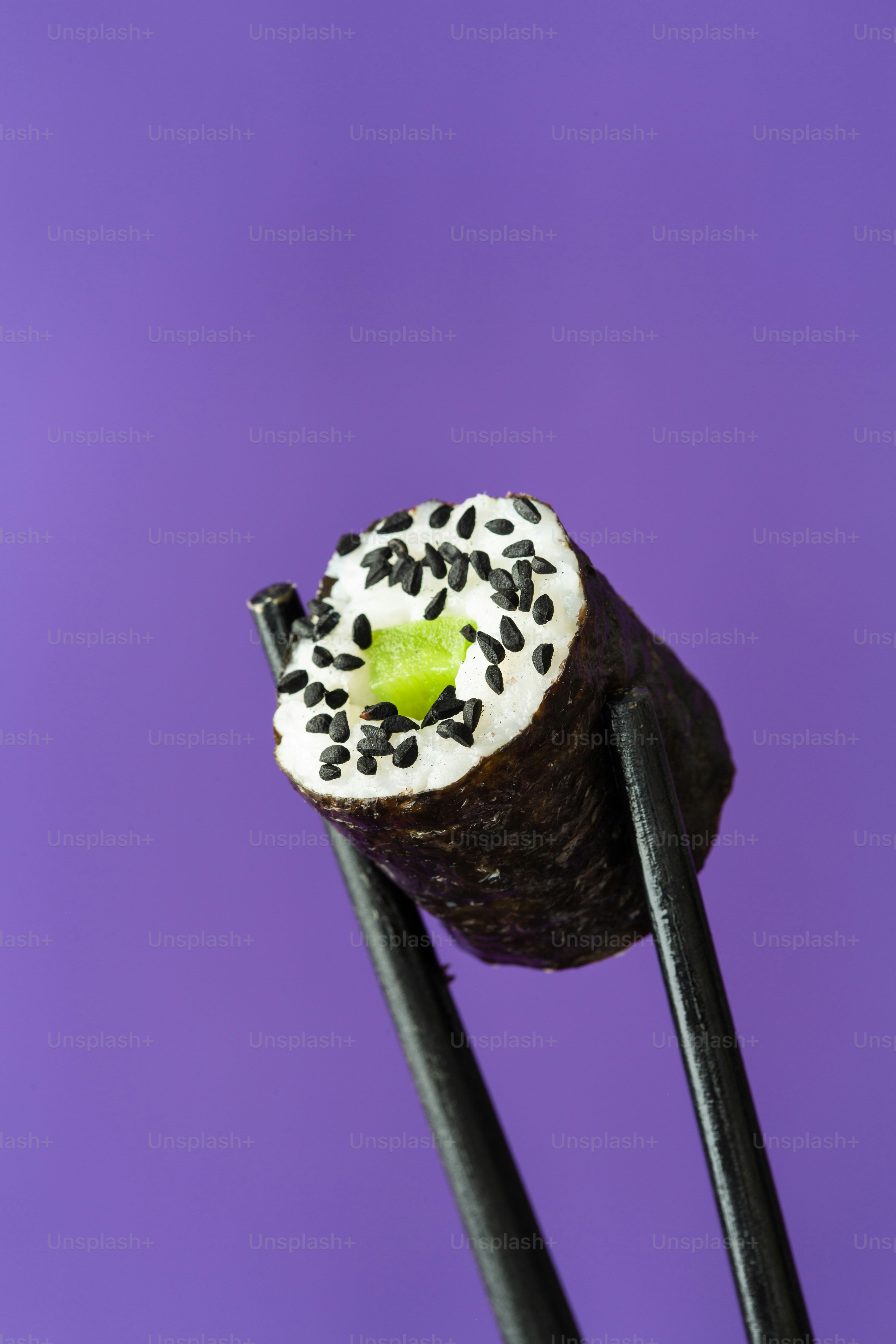 A close up of a piece of cake on a stick