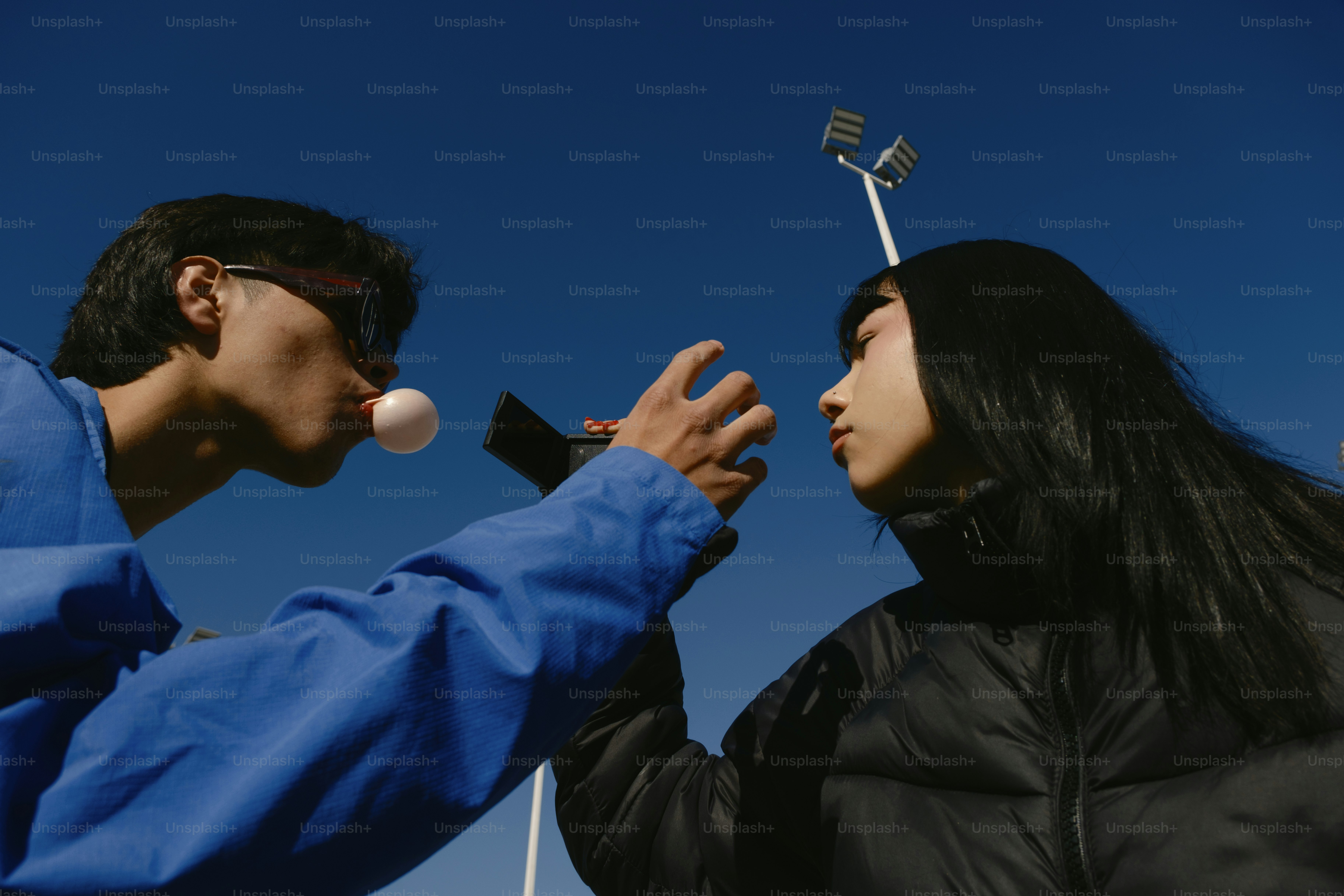 A man and a woman standing next to each other