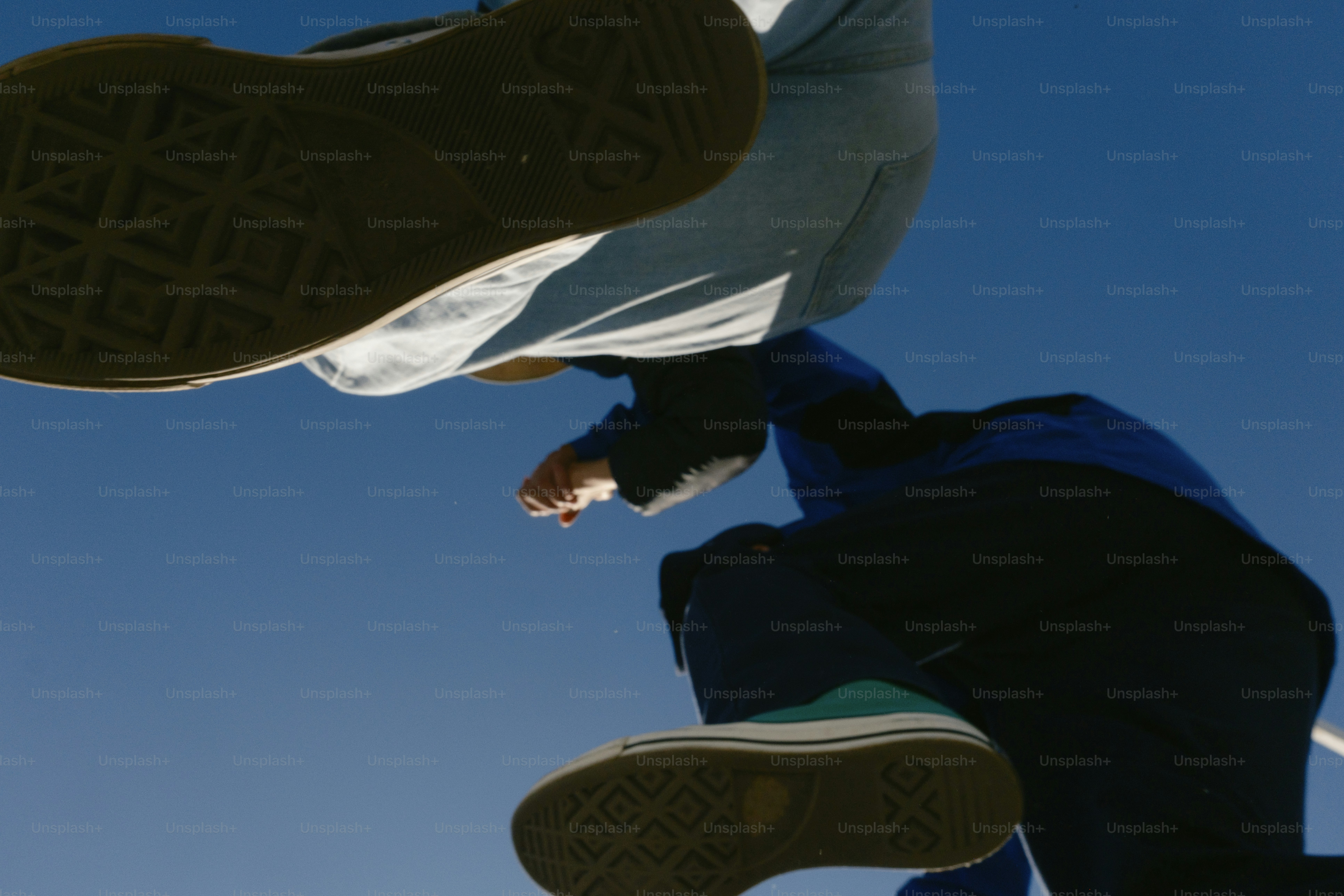 A man flying through the air while riding a skateboard