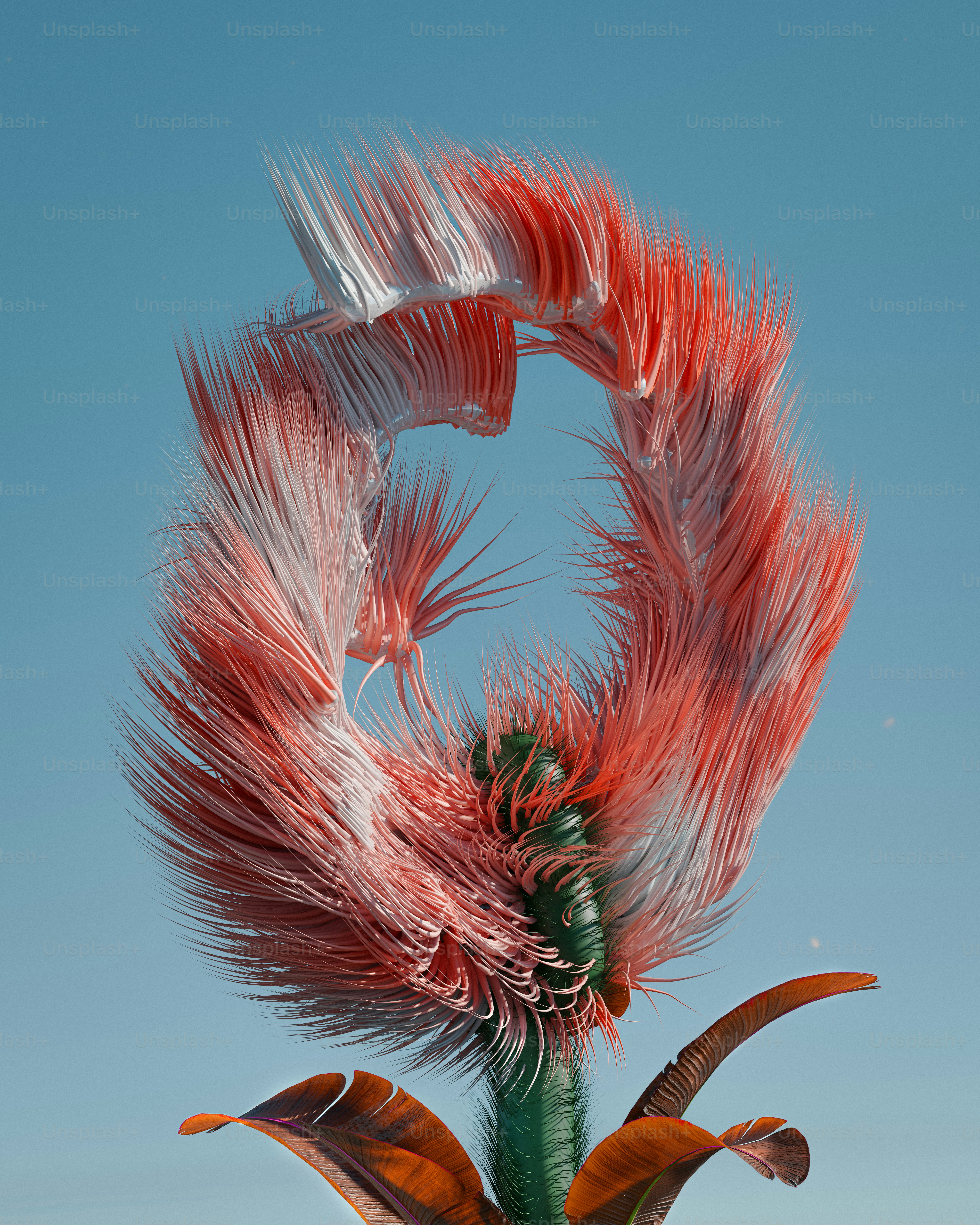 Eine Skulptur einer Pflanze mit roten Federn darauf