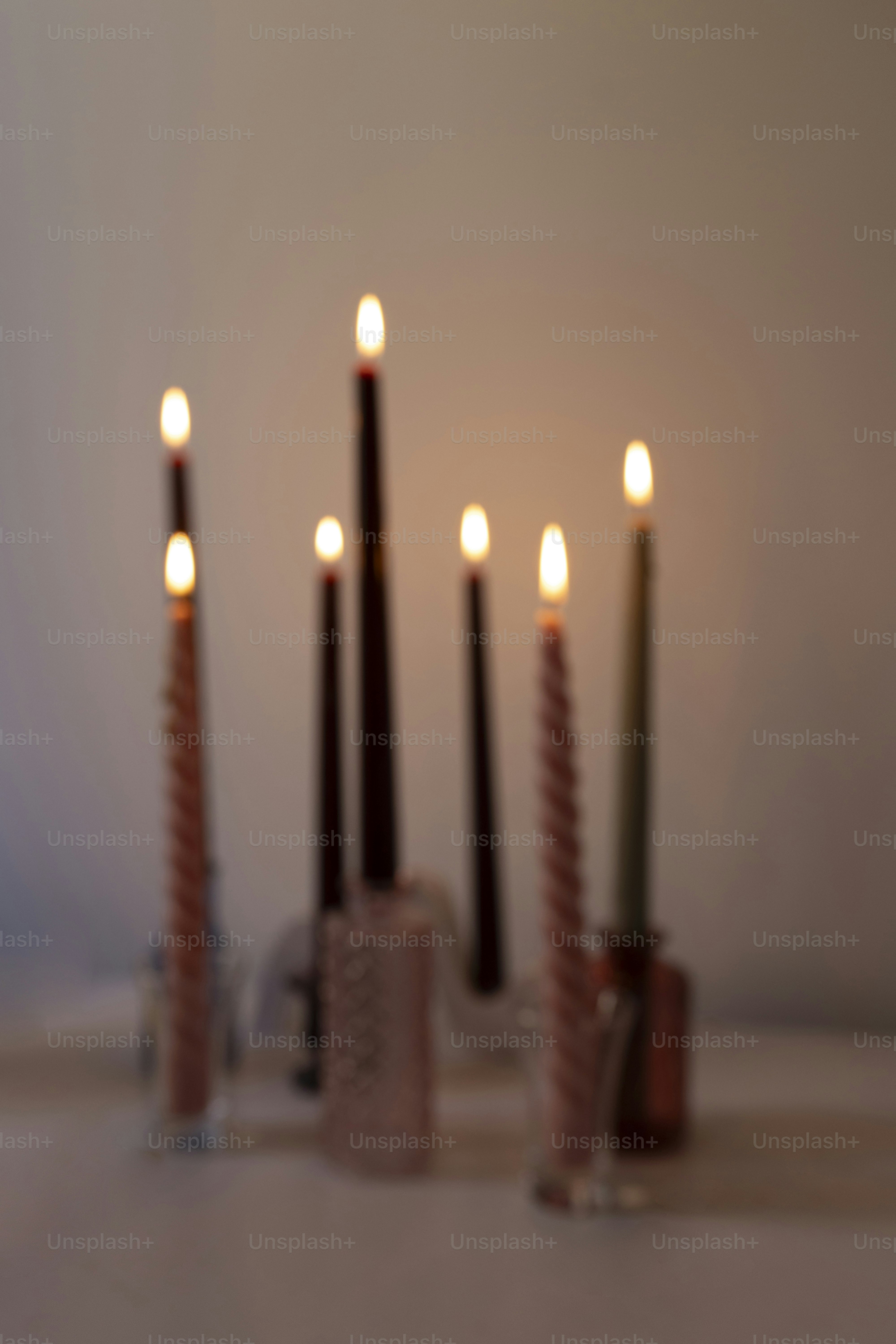 A group of candles sitting on top of a table