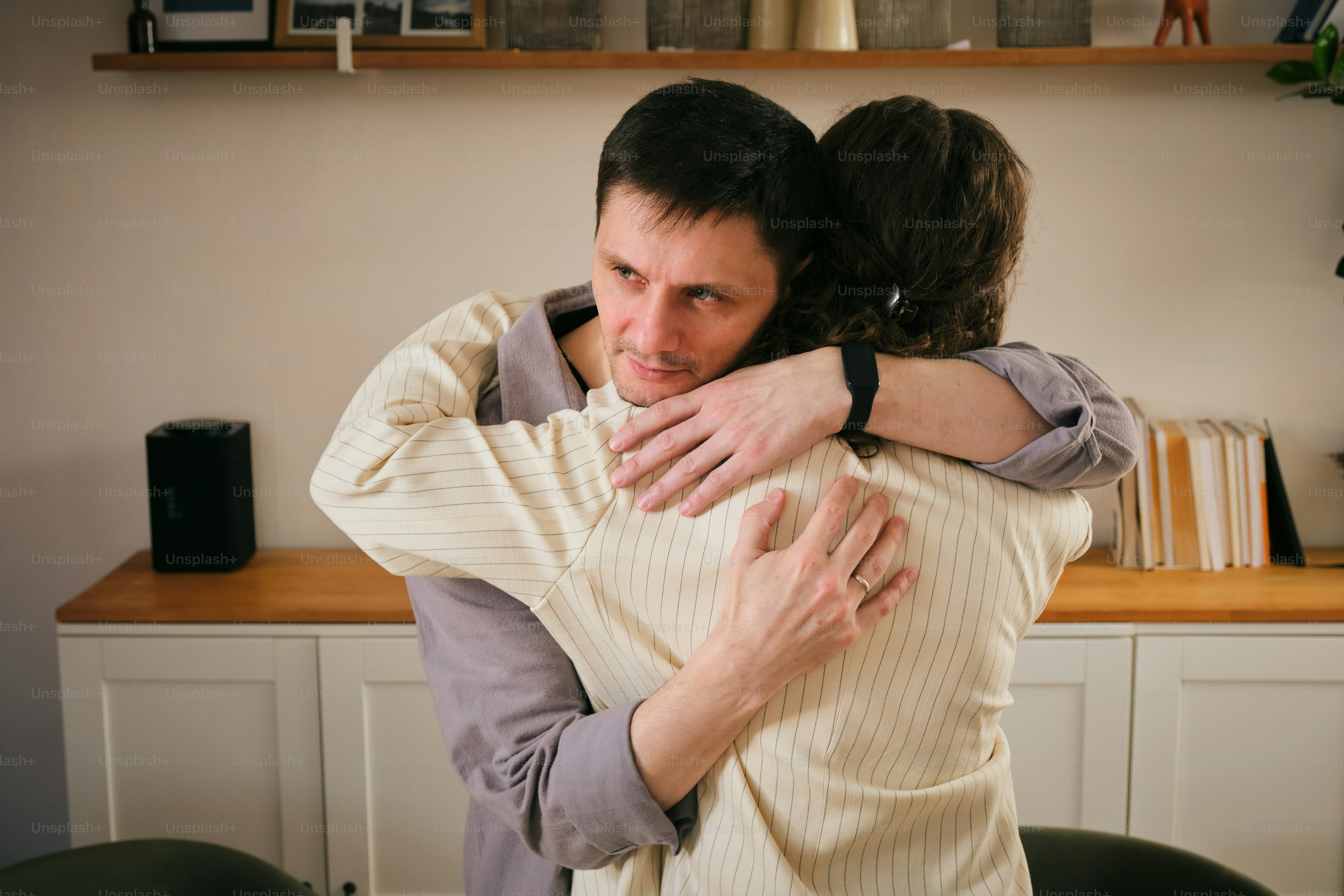 A man and a woman hugging each other