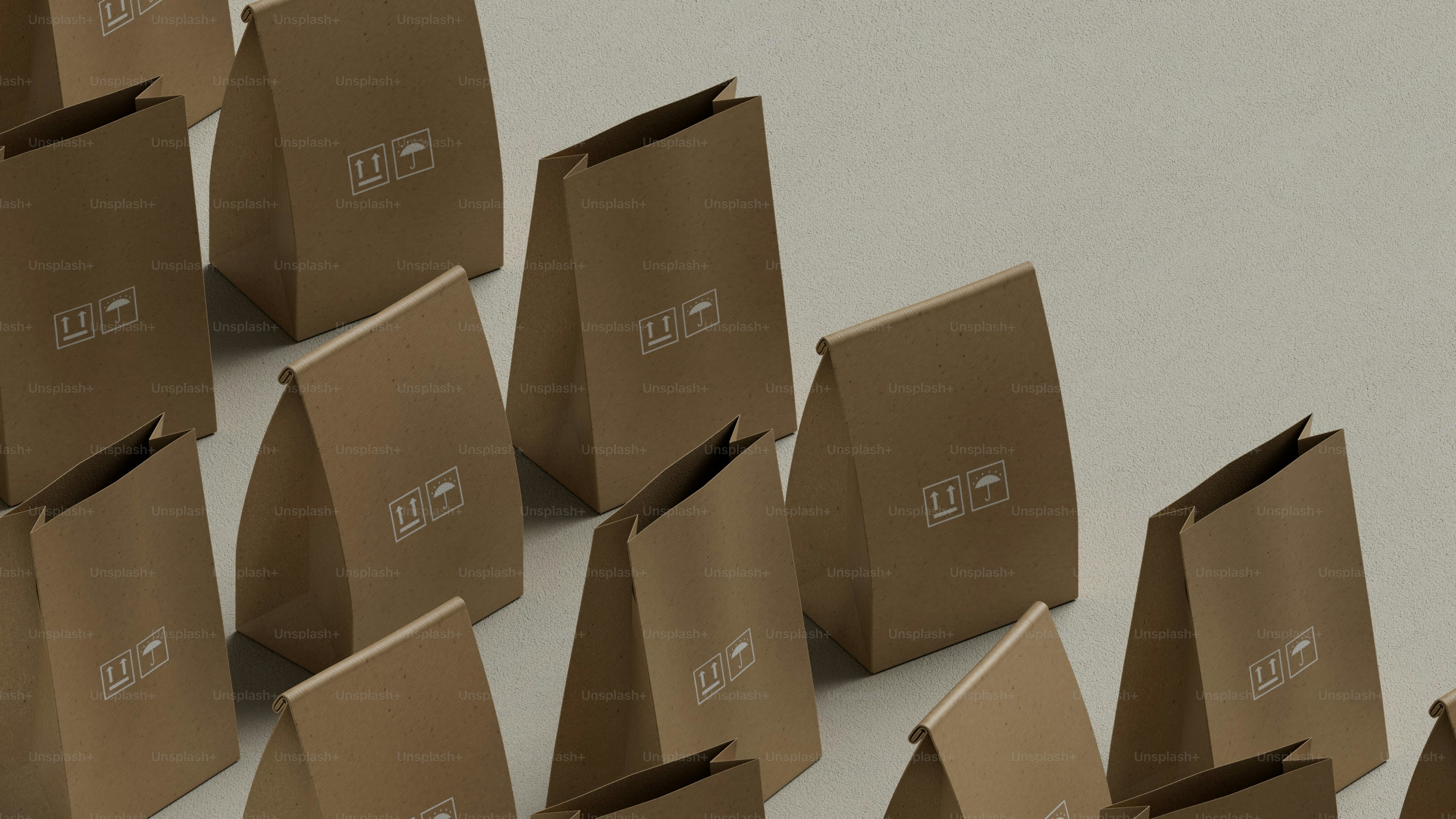 A group of brown bags sitting on top of each other