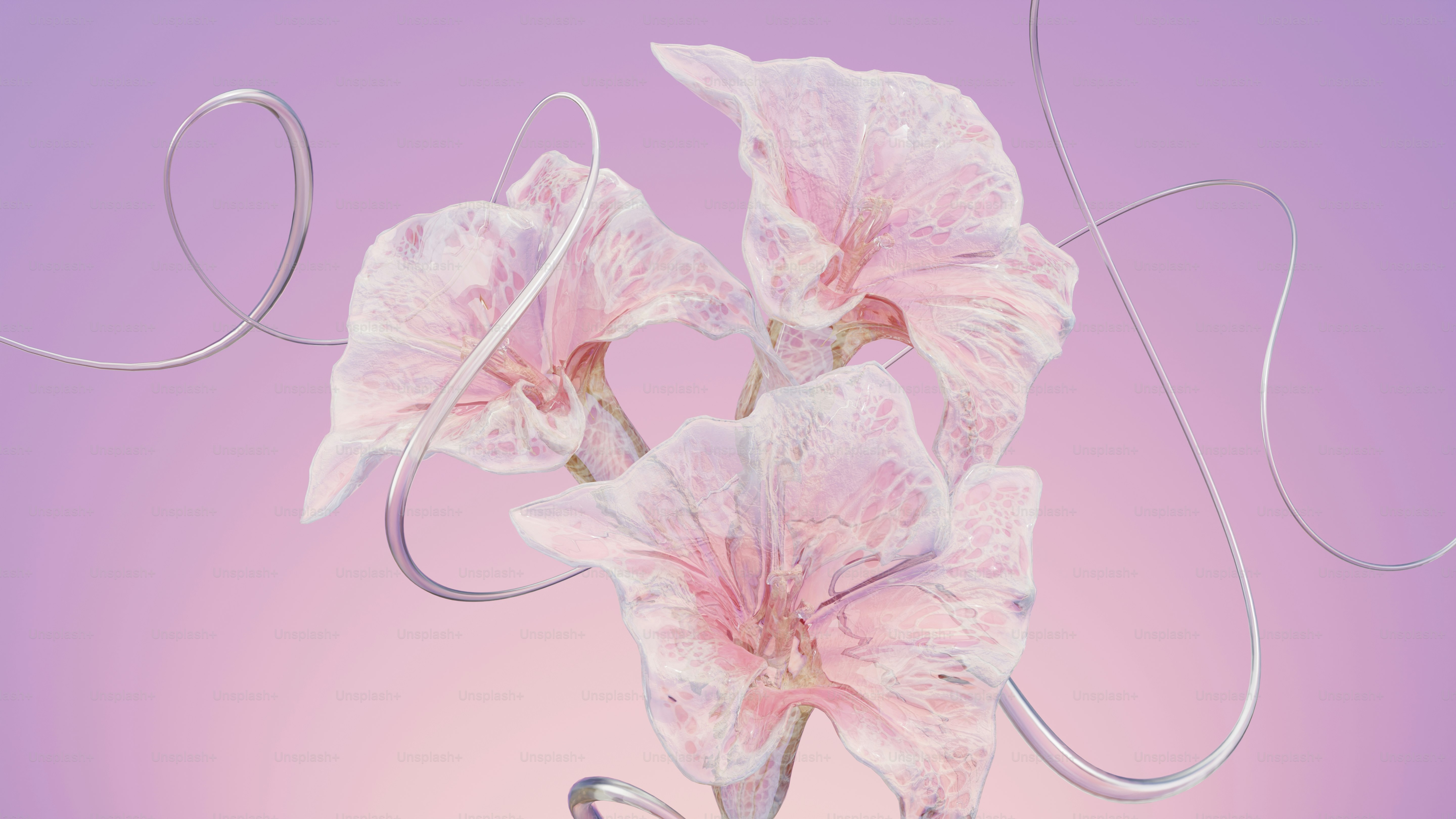A glass vase filled with pink flowers on top of a table