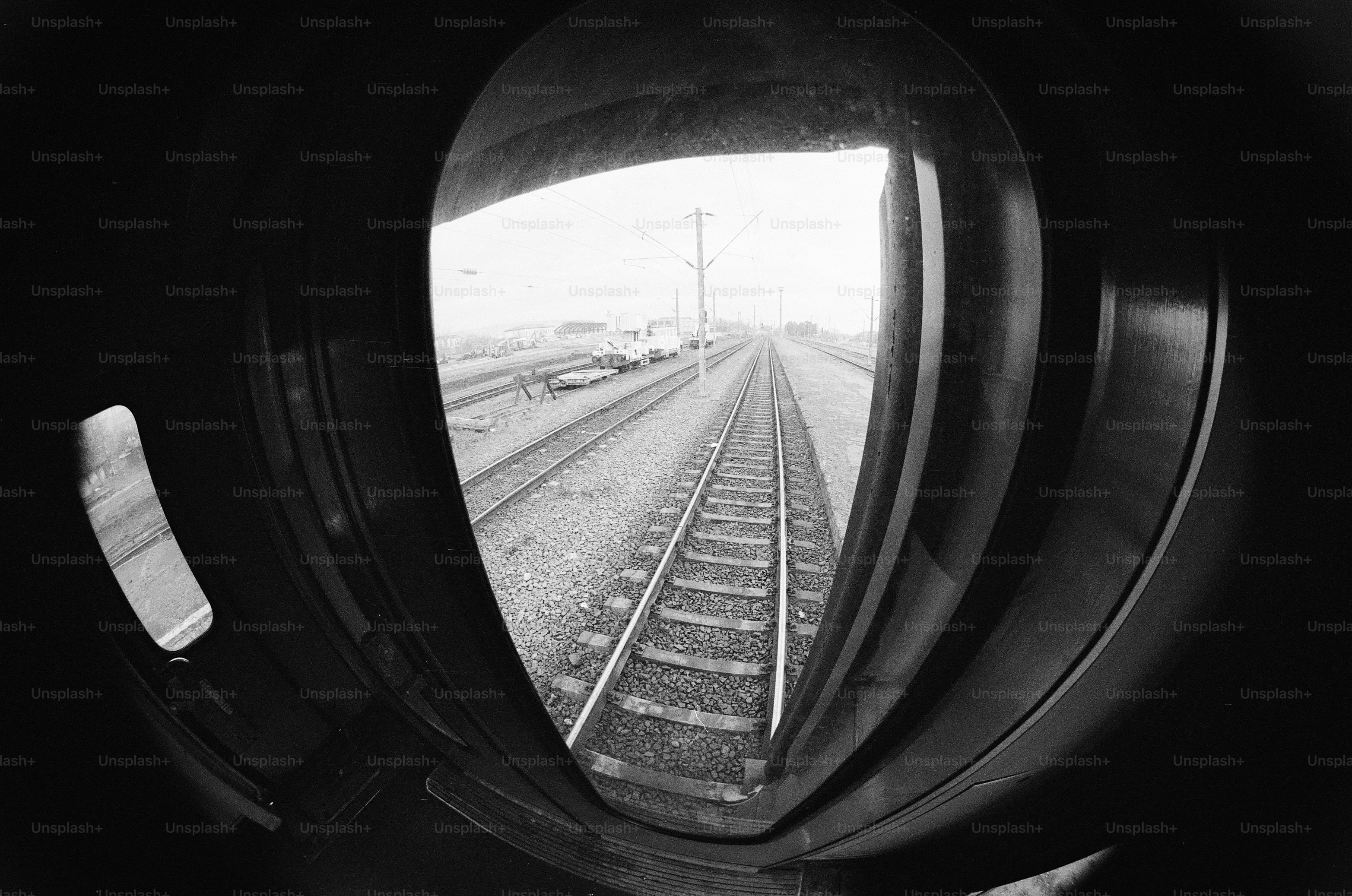 A view of a train track through a window