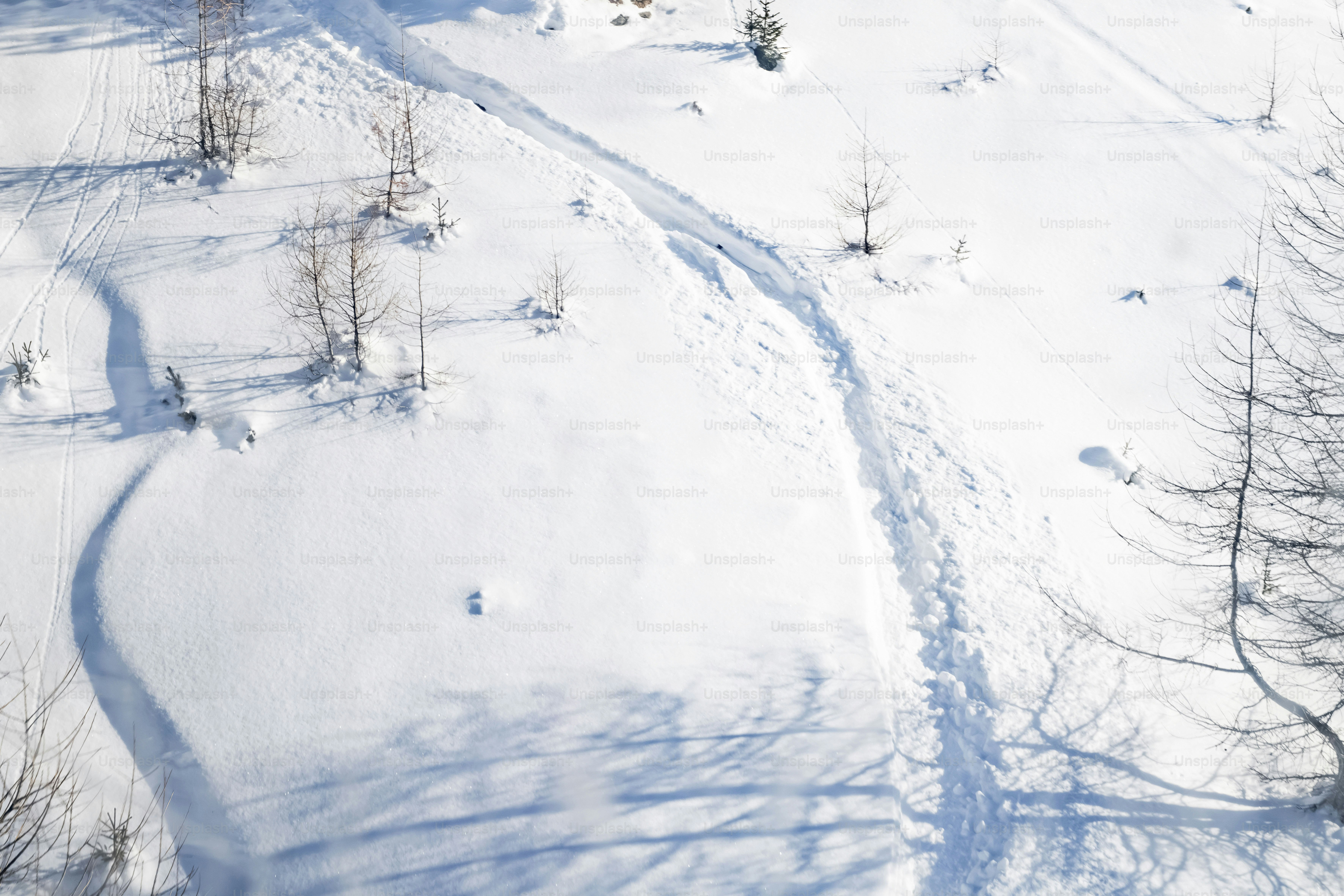 An aerial view of a snow covered field