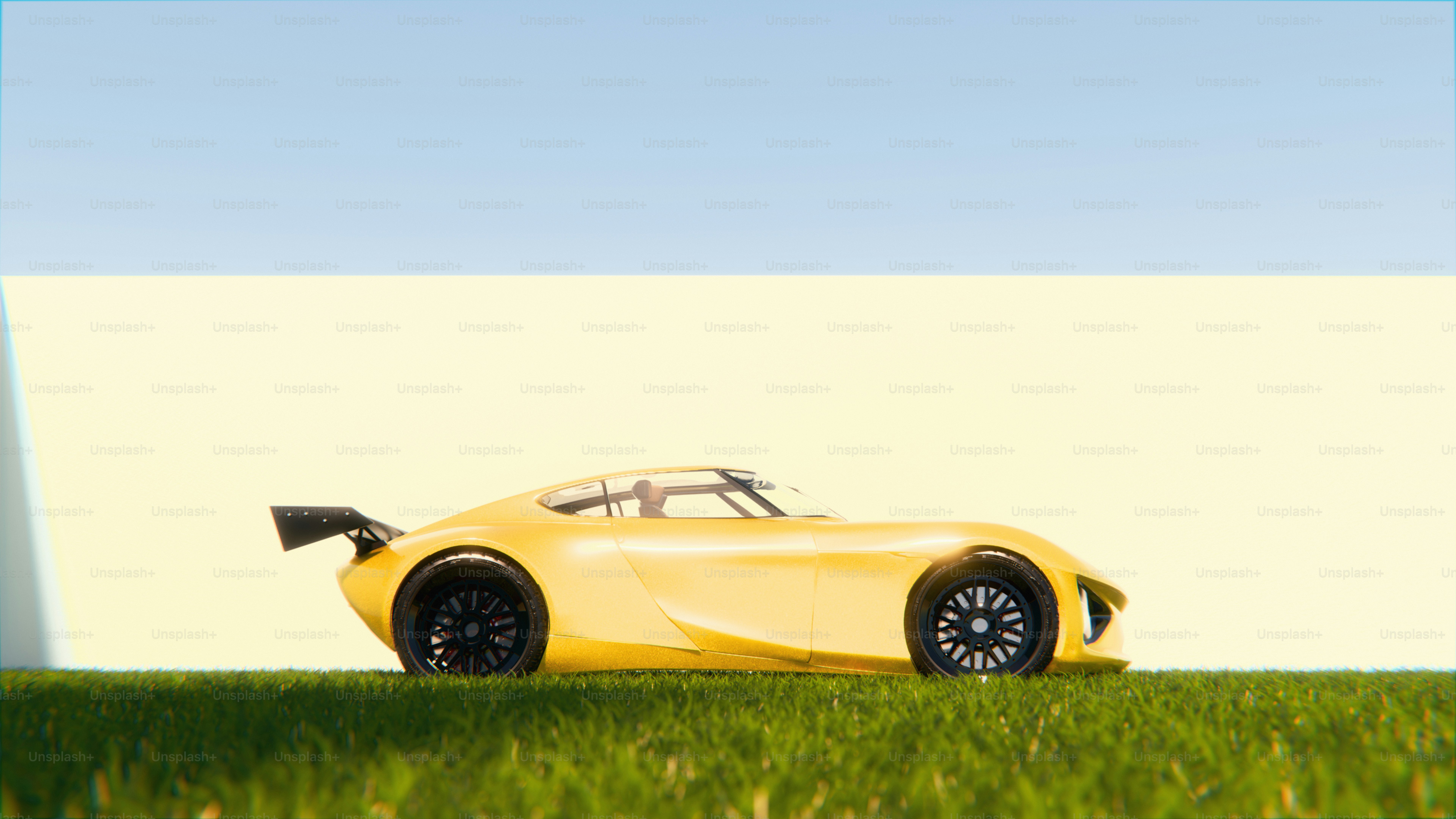 A yellow sports car is parked in the grass