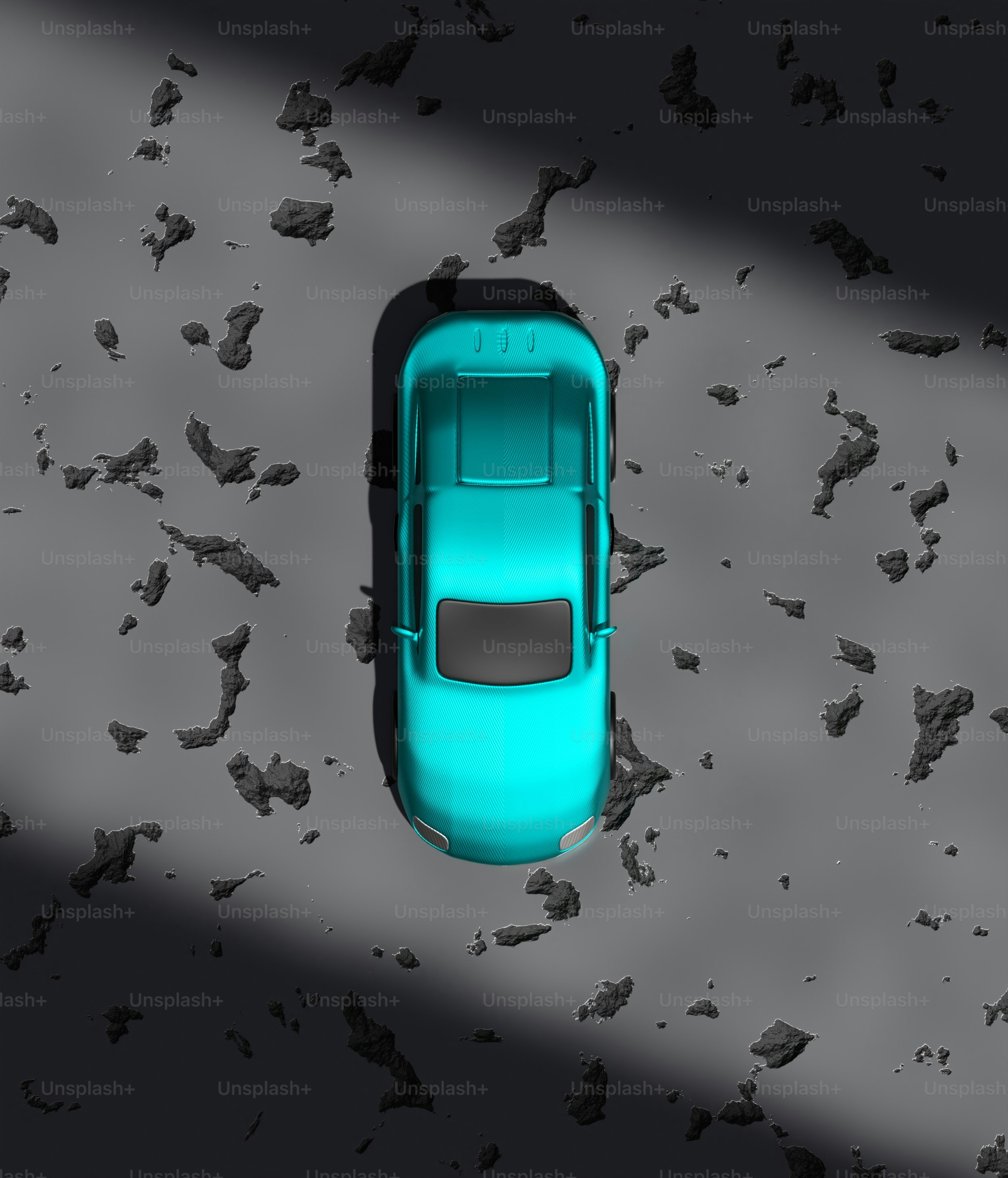 A blue car is parked in a parking lot