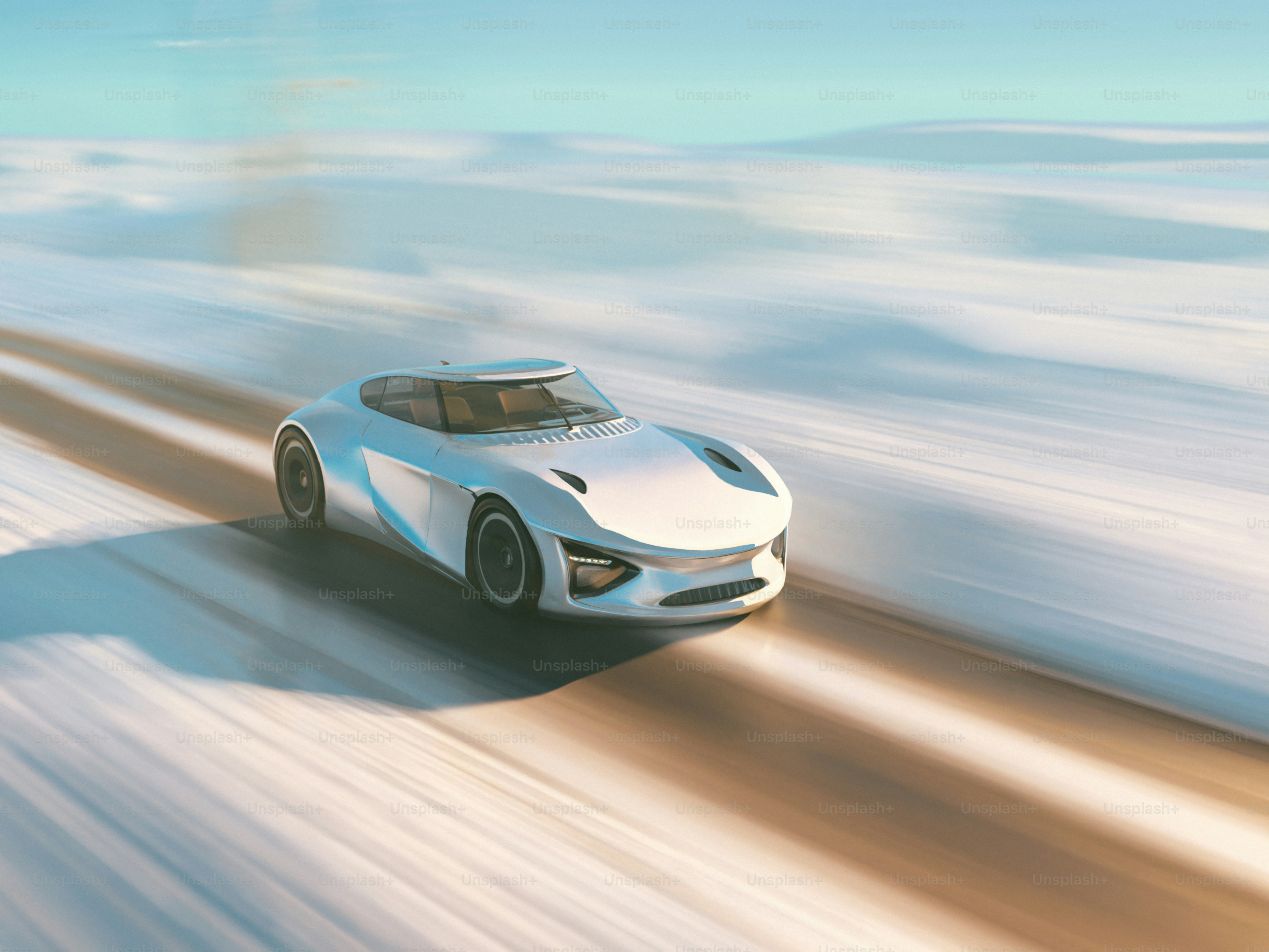 A white sports car driving on a snowy road