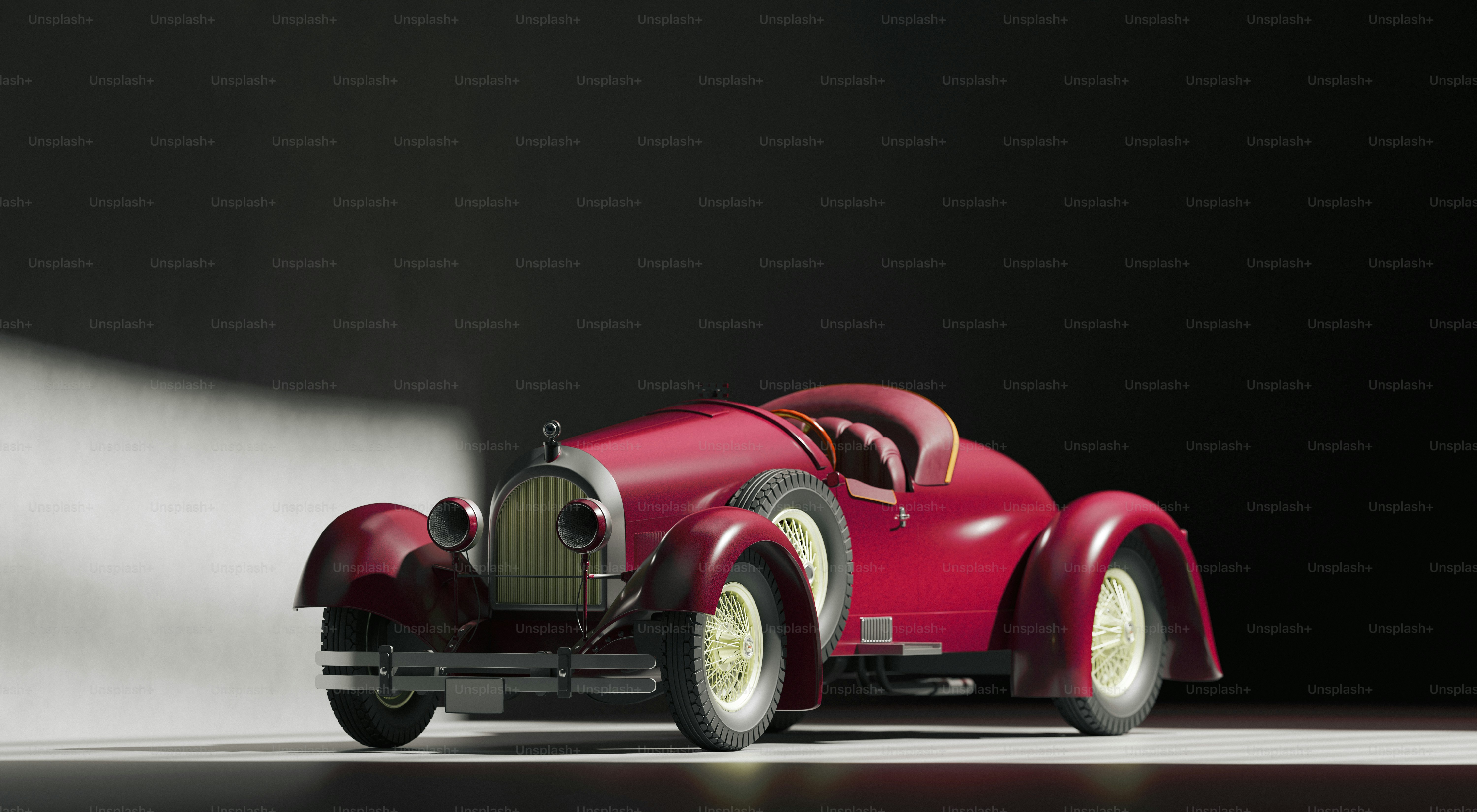 A red car is parked in a dark room