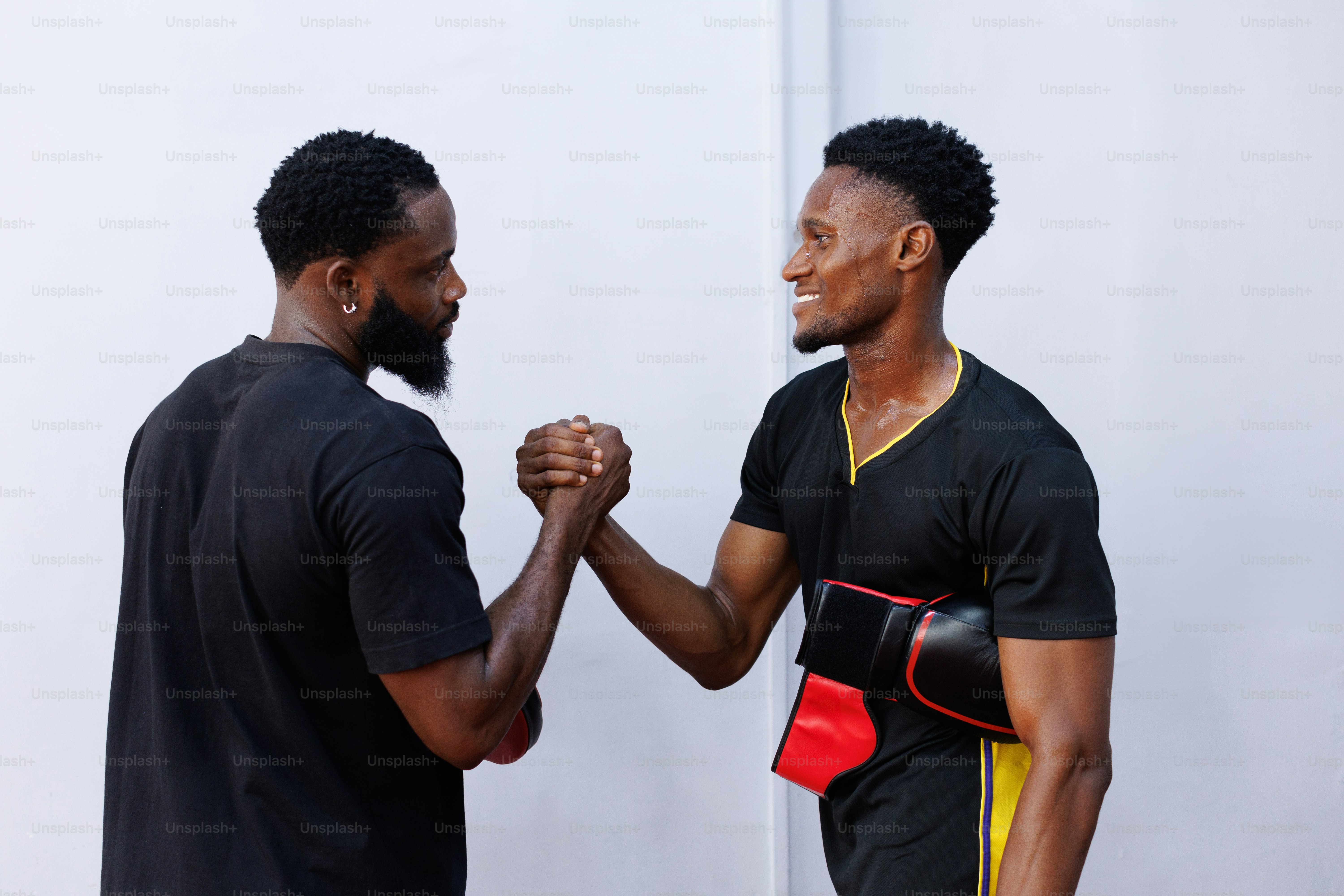 A couple of men standing next to each other