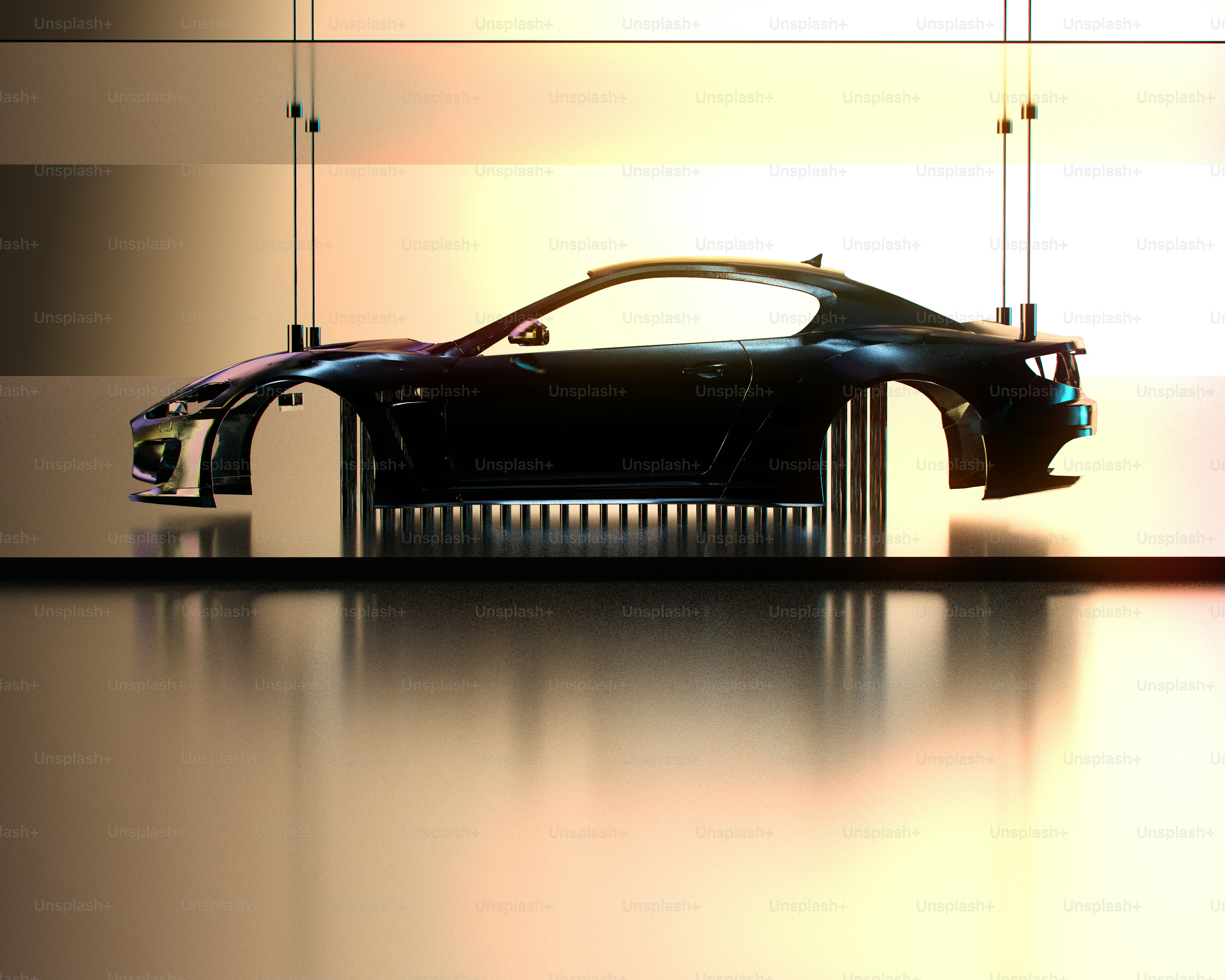 A black car is sitting in a room