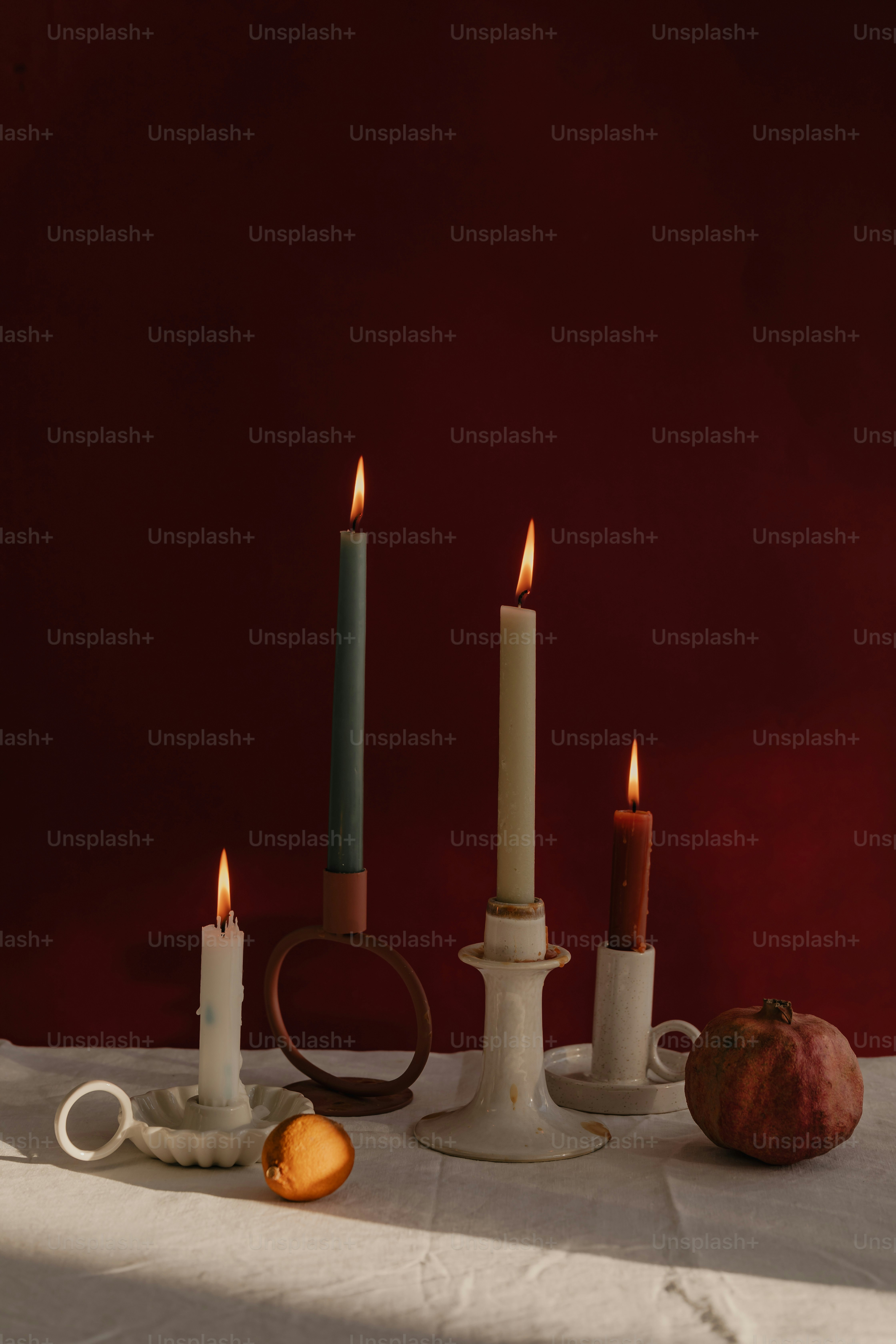 A group of candles sitting on top of a table