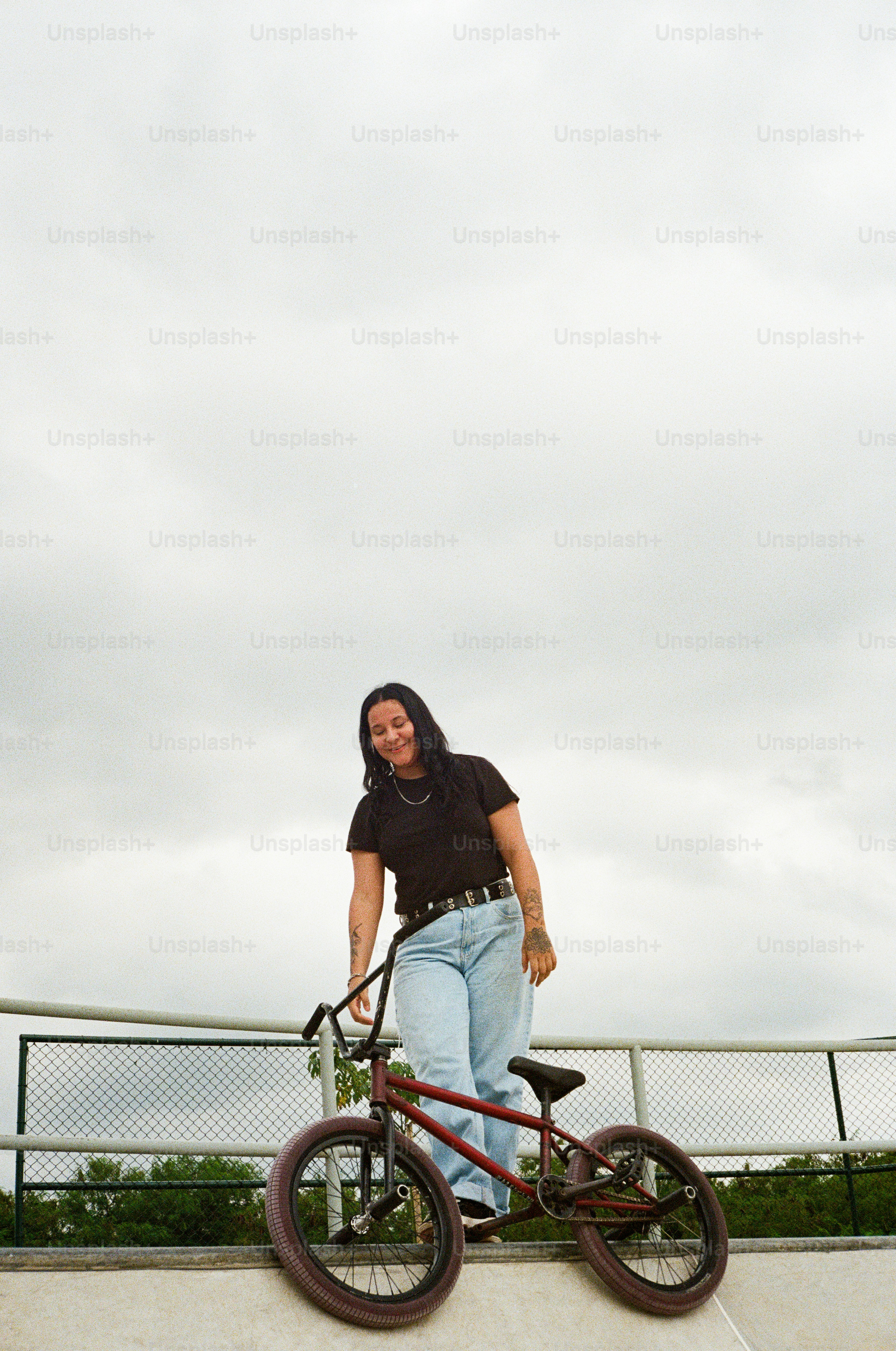 A person riding a bike on a ramp