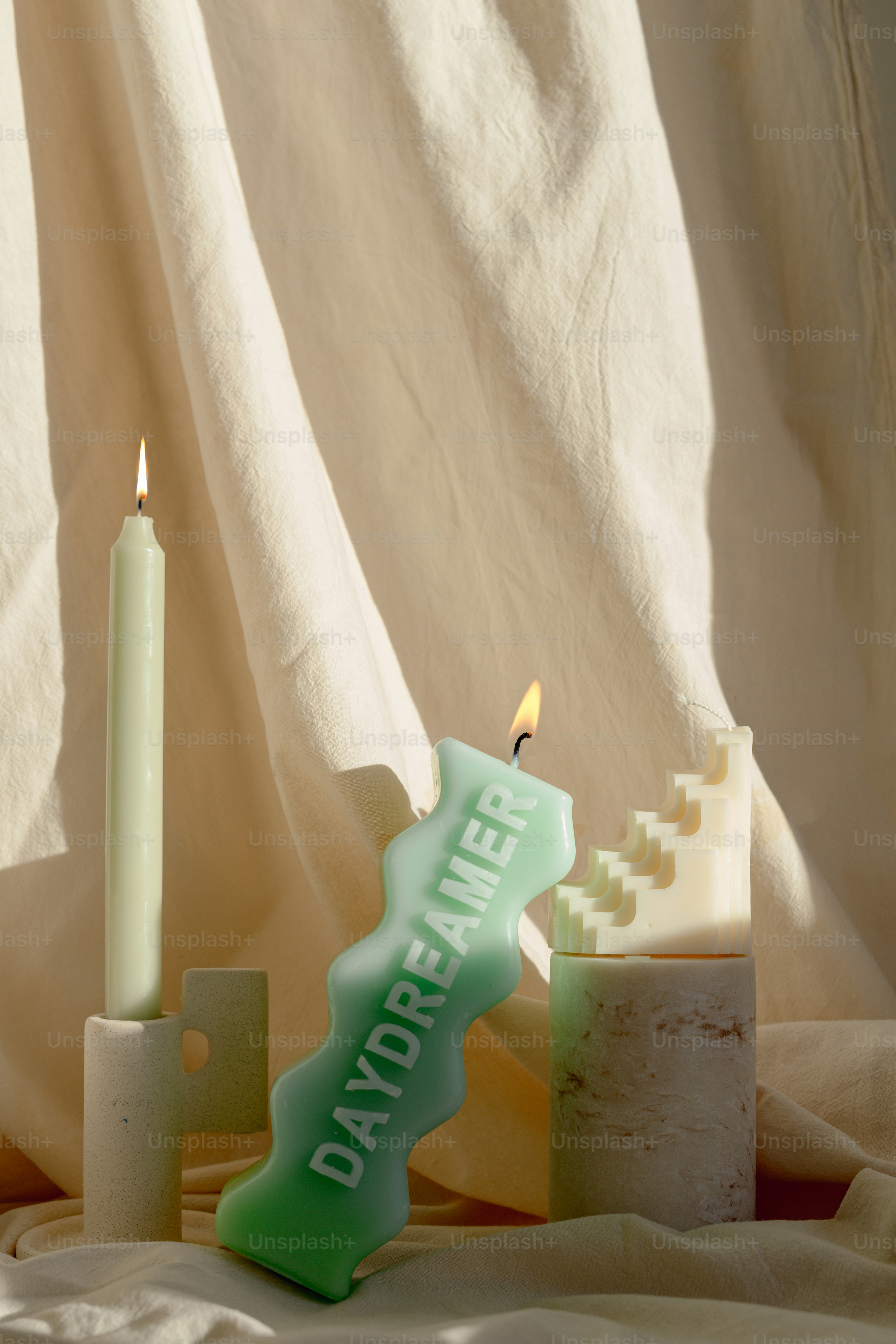 A group of candles sitting on top of a table