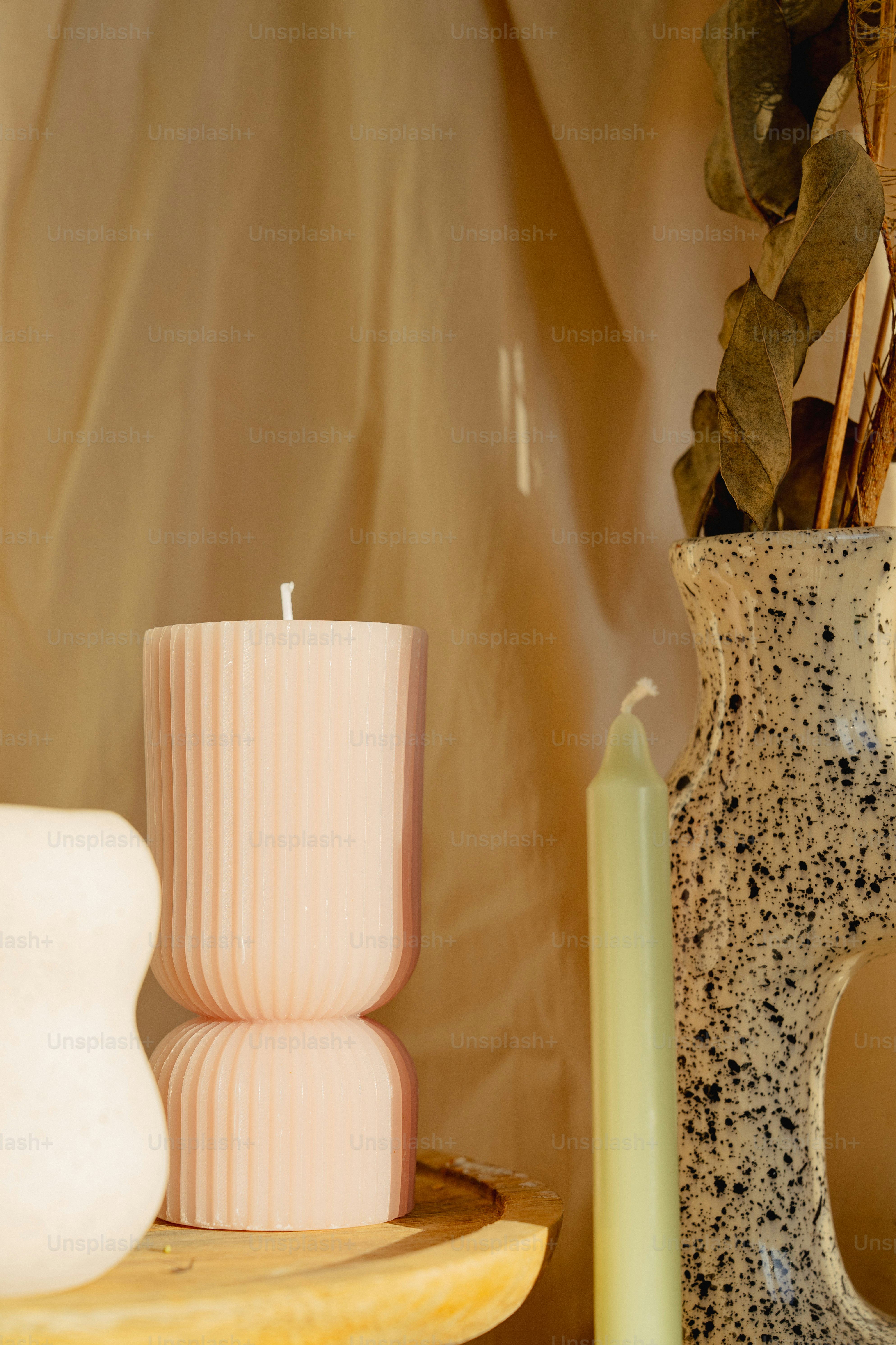 A couple of vases sitting on top of a table