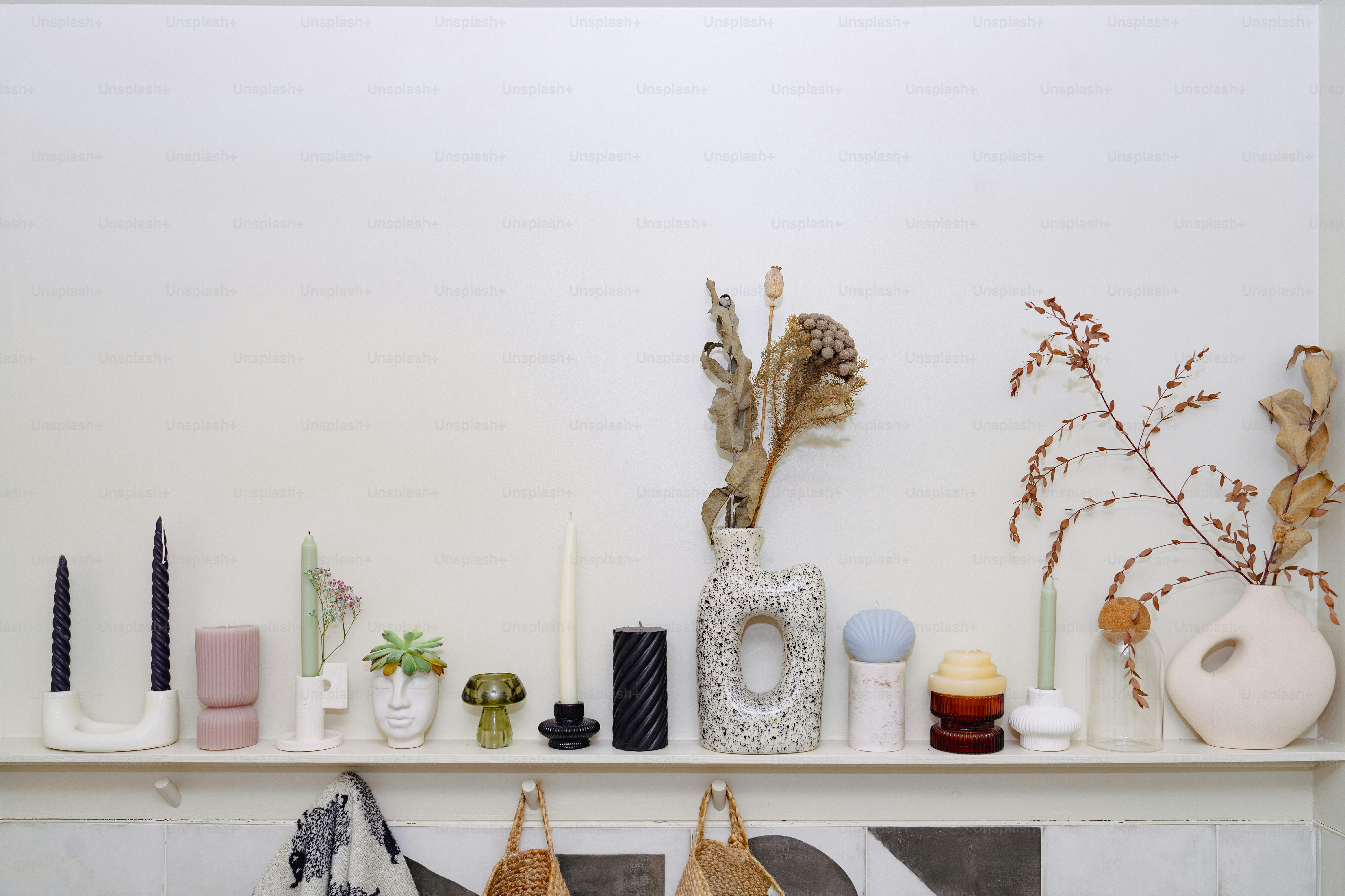 A shelf filled with vases and other items