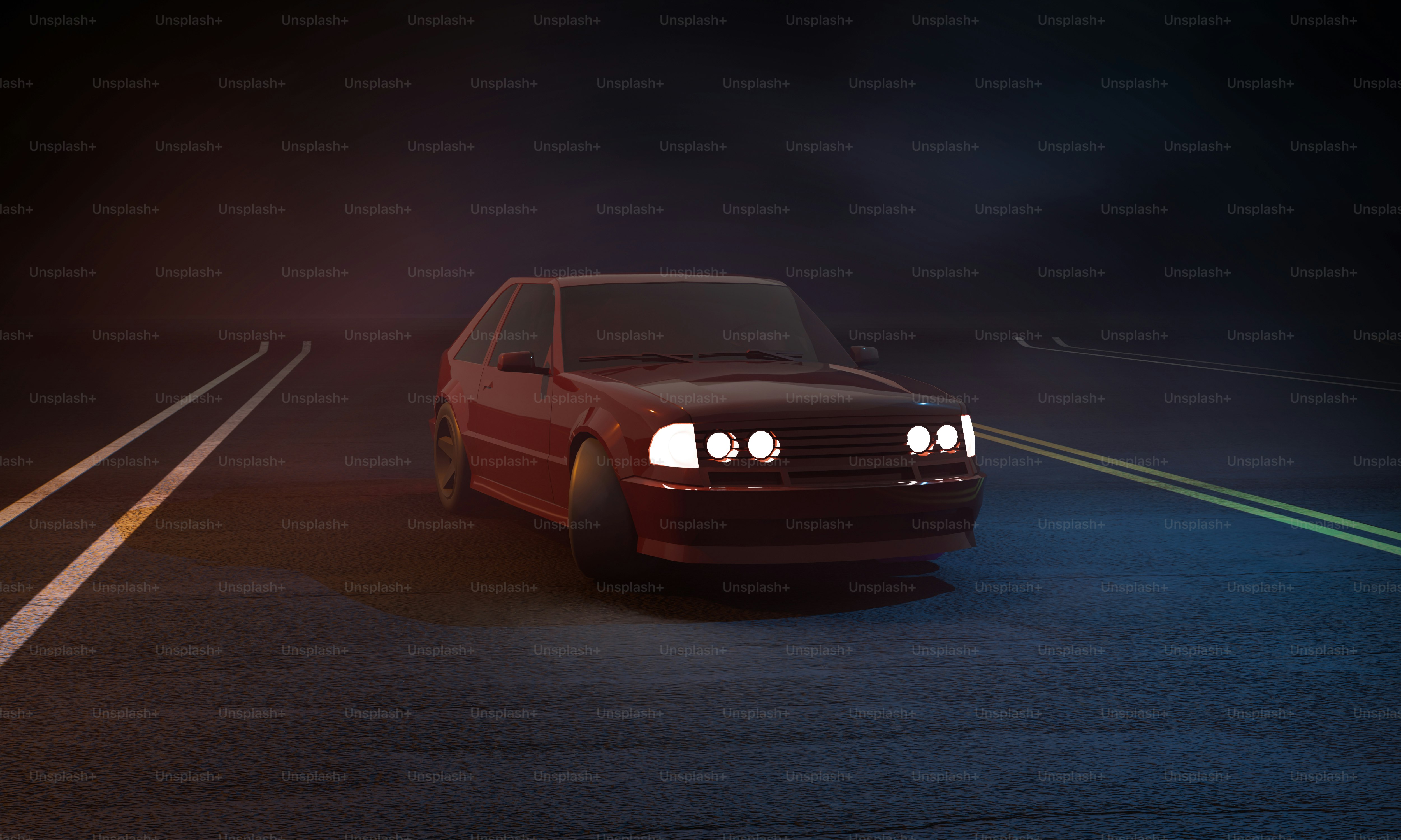 A red car driving down a street at night