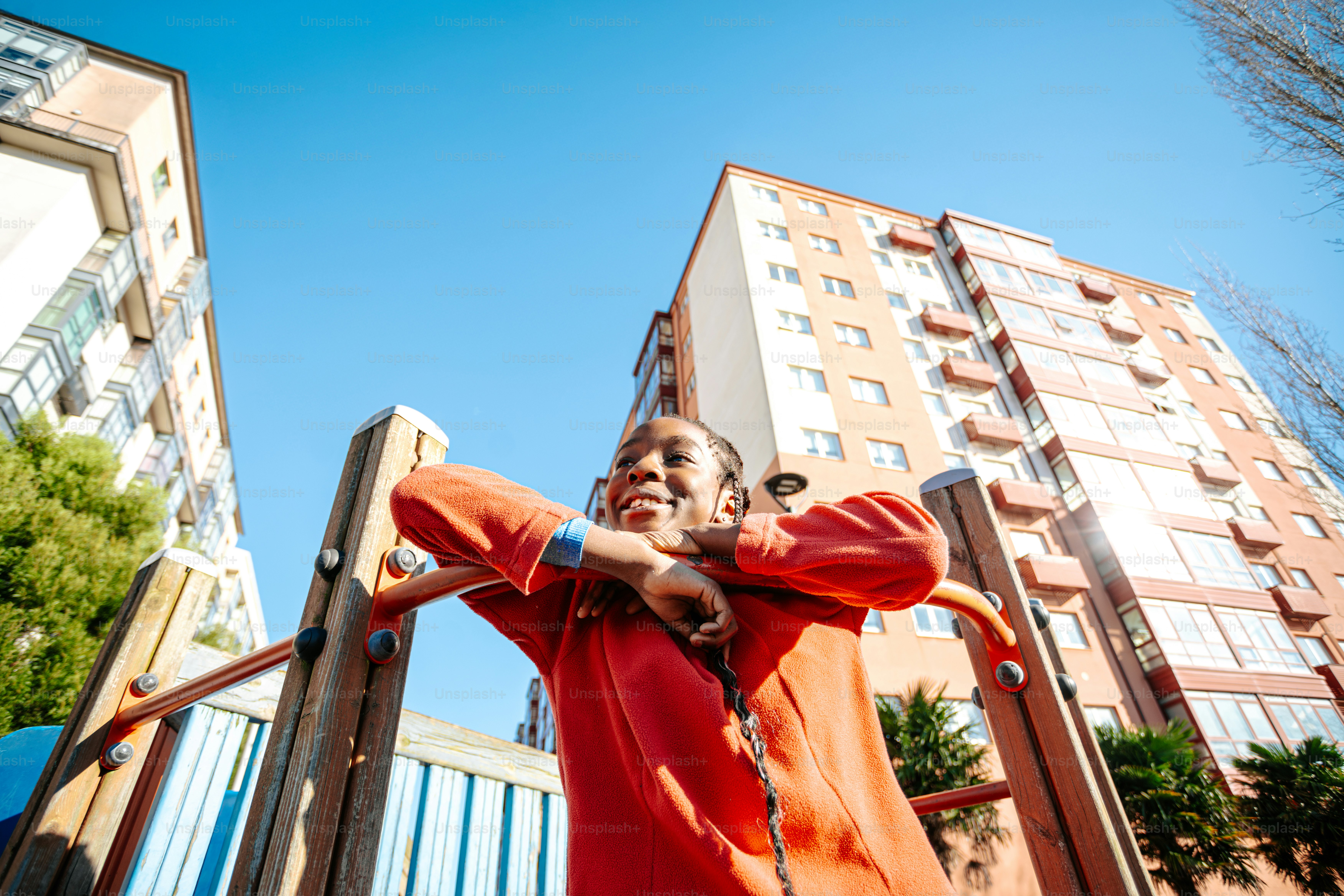 A man standing in front of a tall building