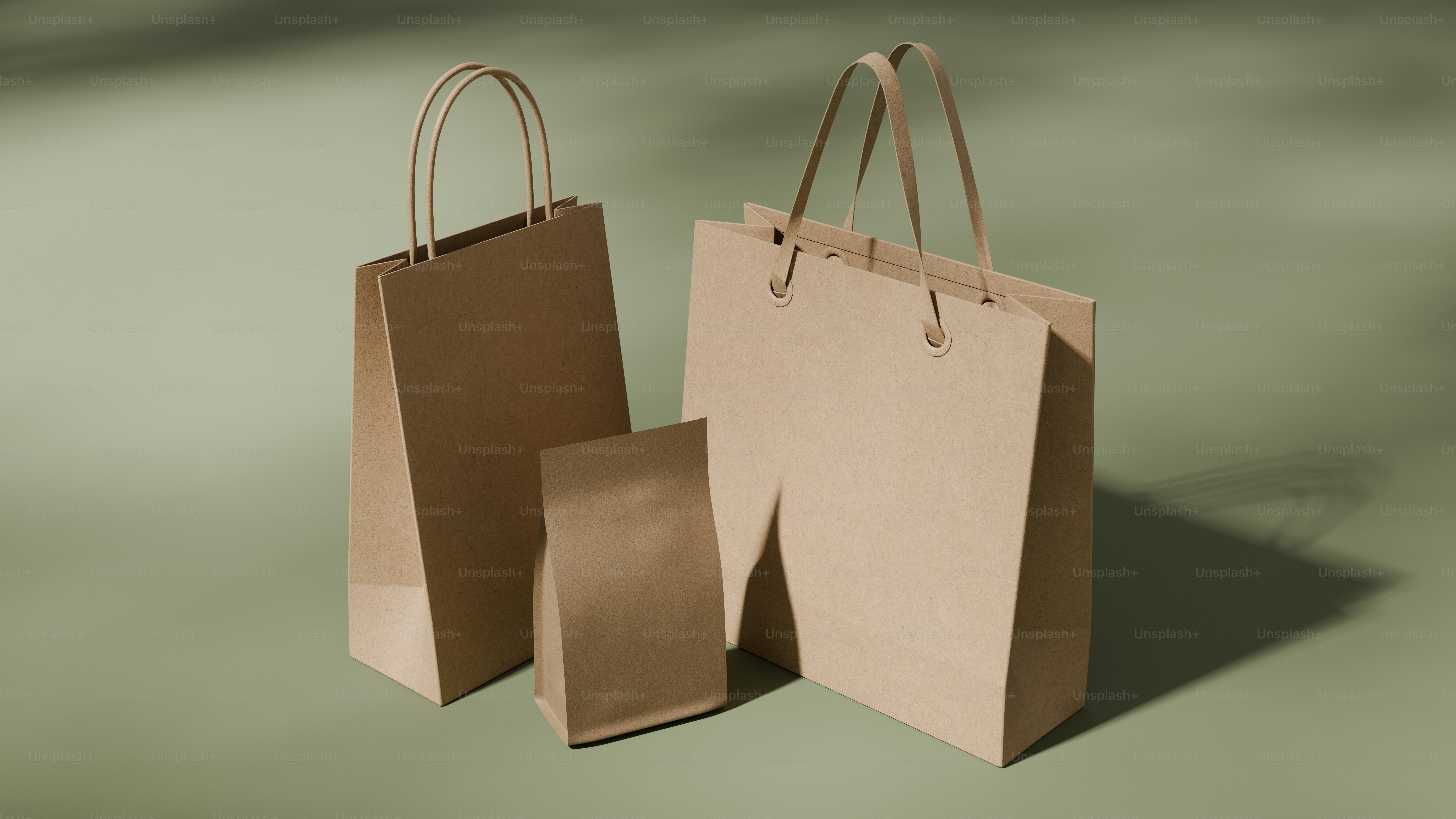 Two brown bags sitting next to each other on a table