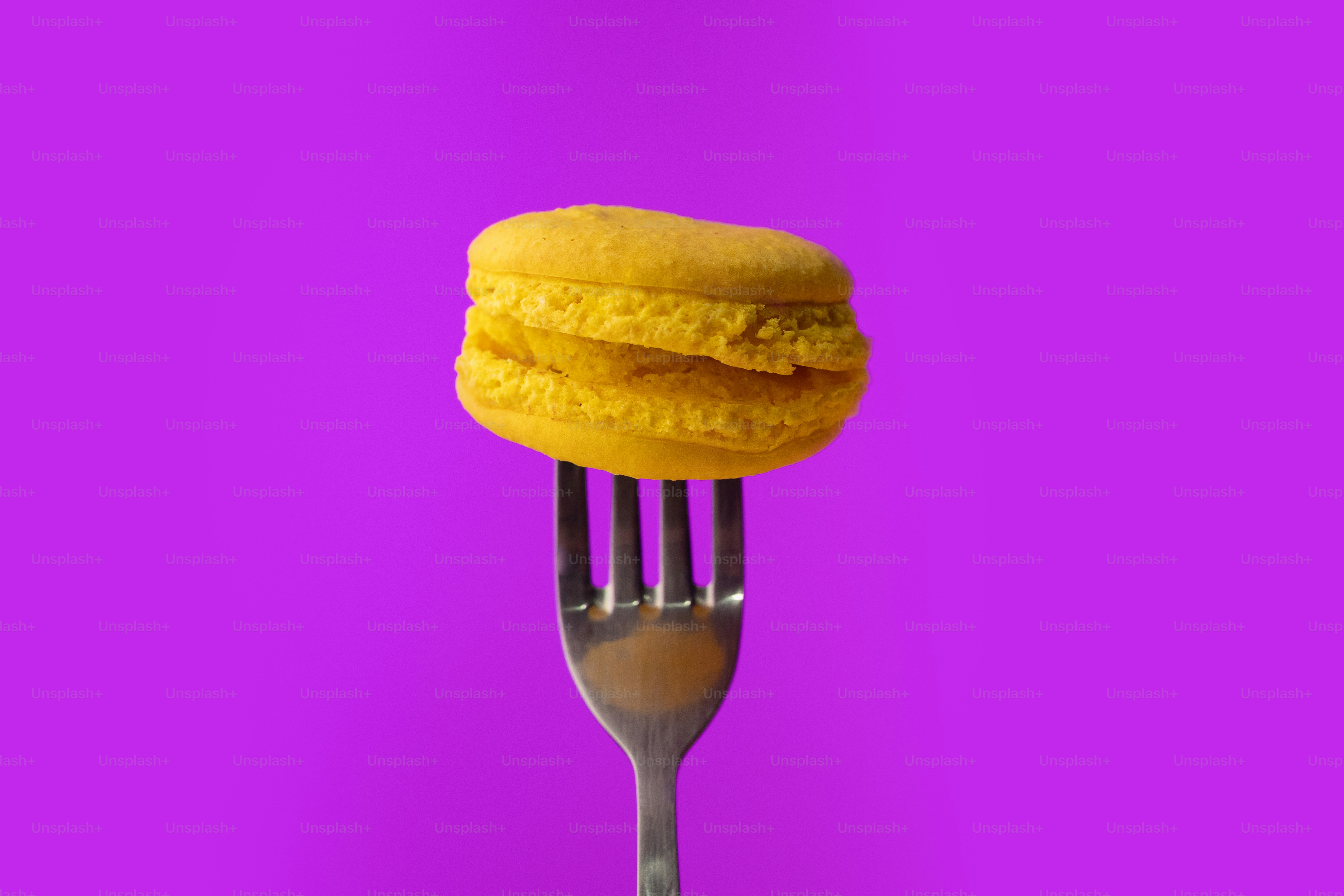 A fork with a piece of food on it