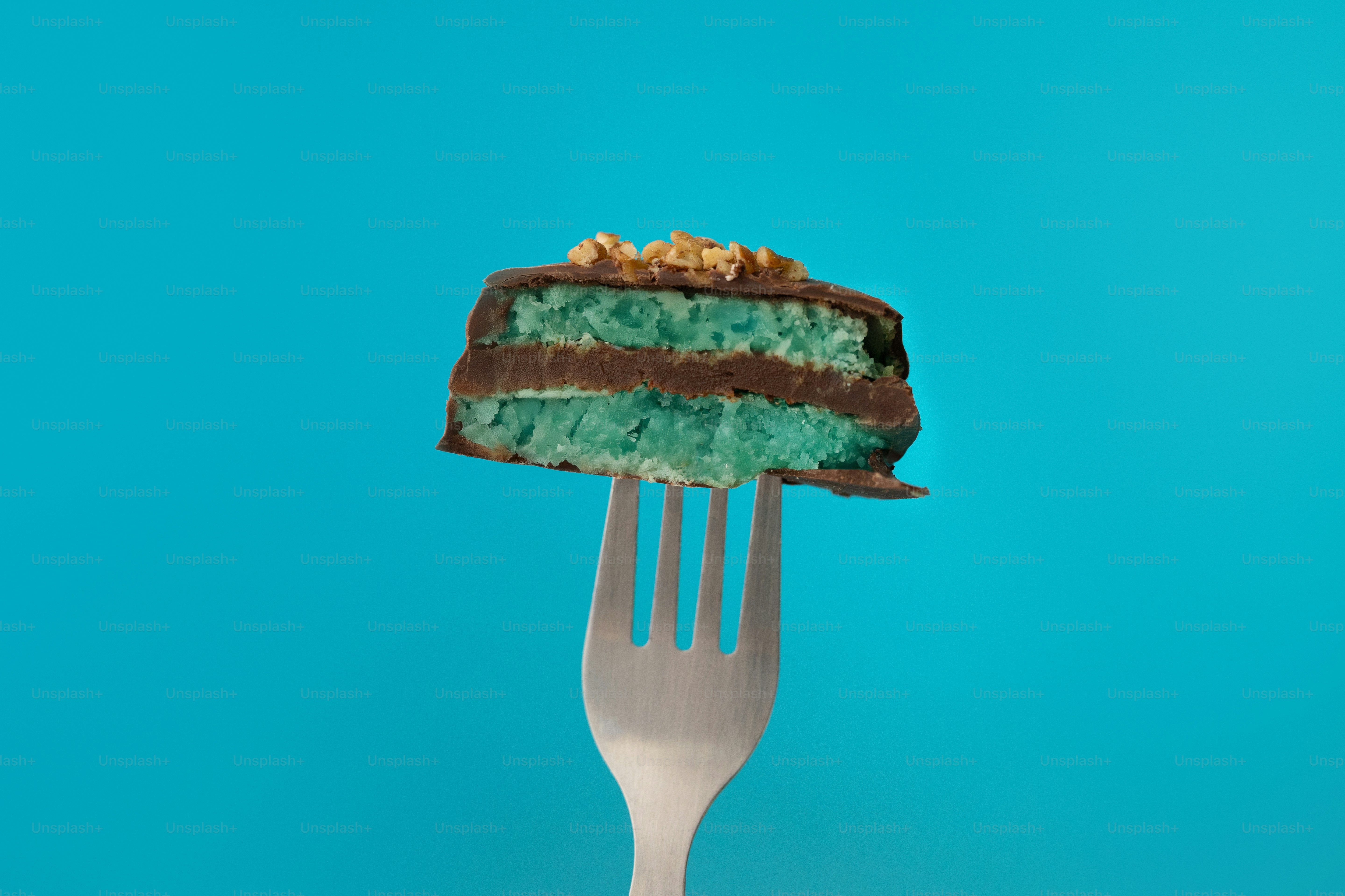 A piece of cake sitting on top of a fork