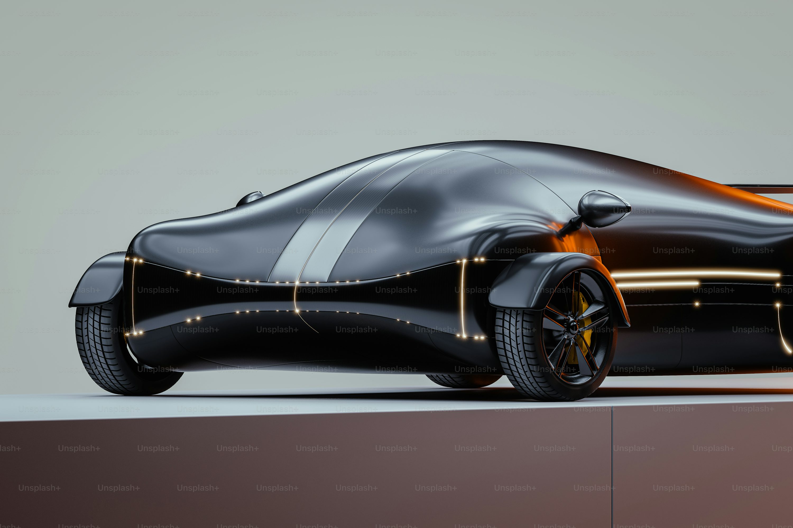 A futuristic car is shown on a table