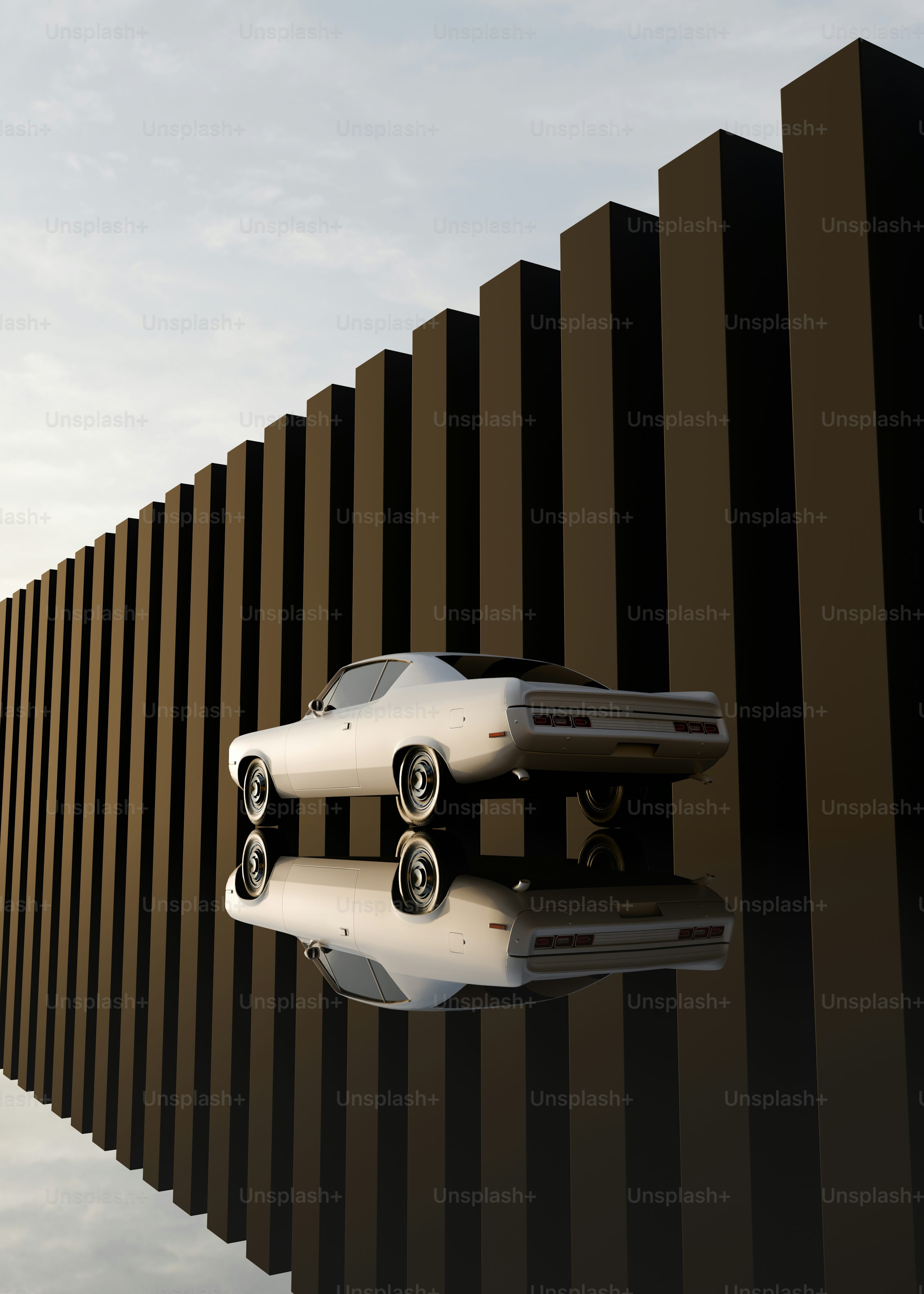 A car is parked in front of a wall