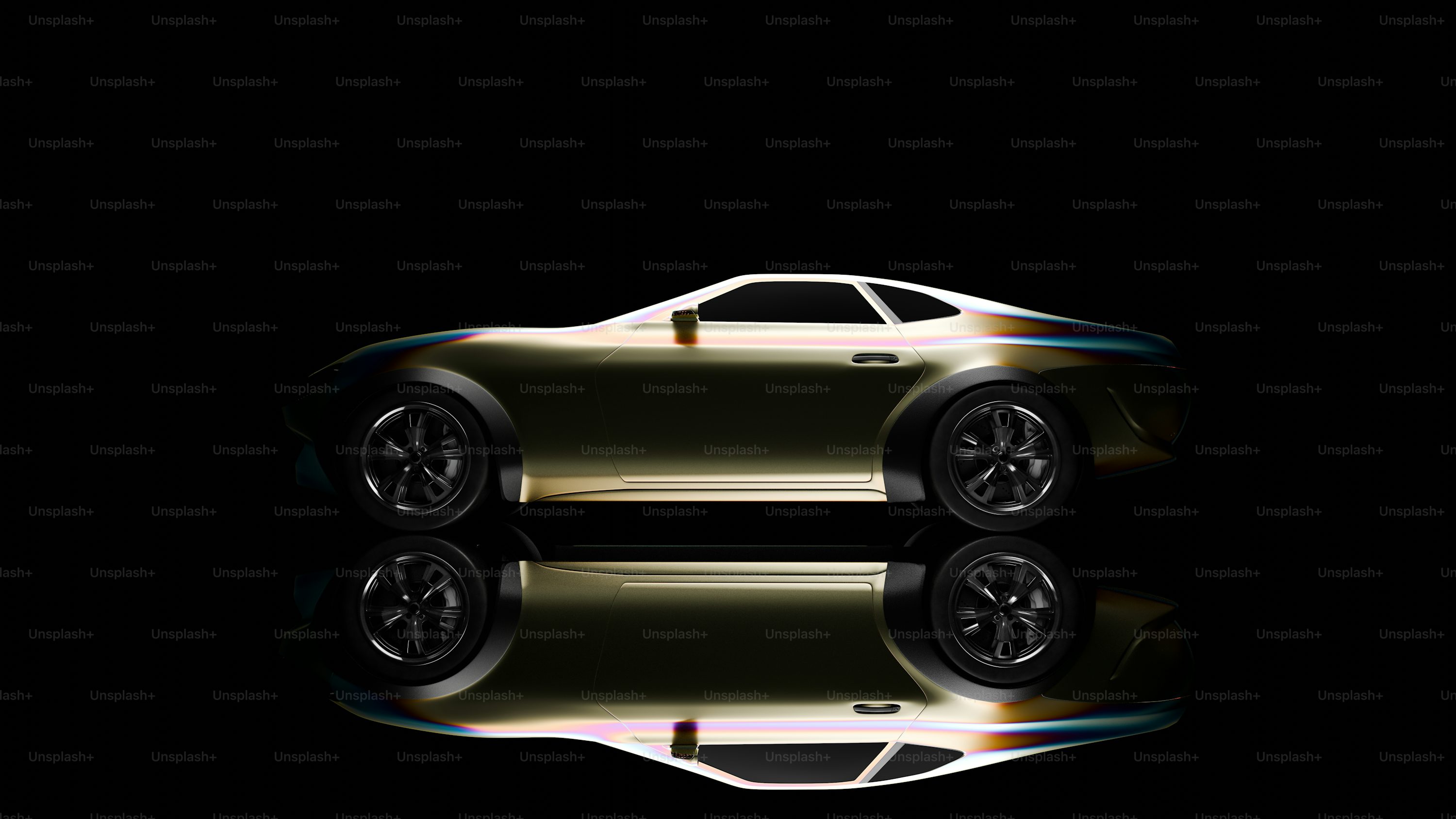 A gold sports car is shown in the dark