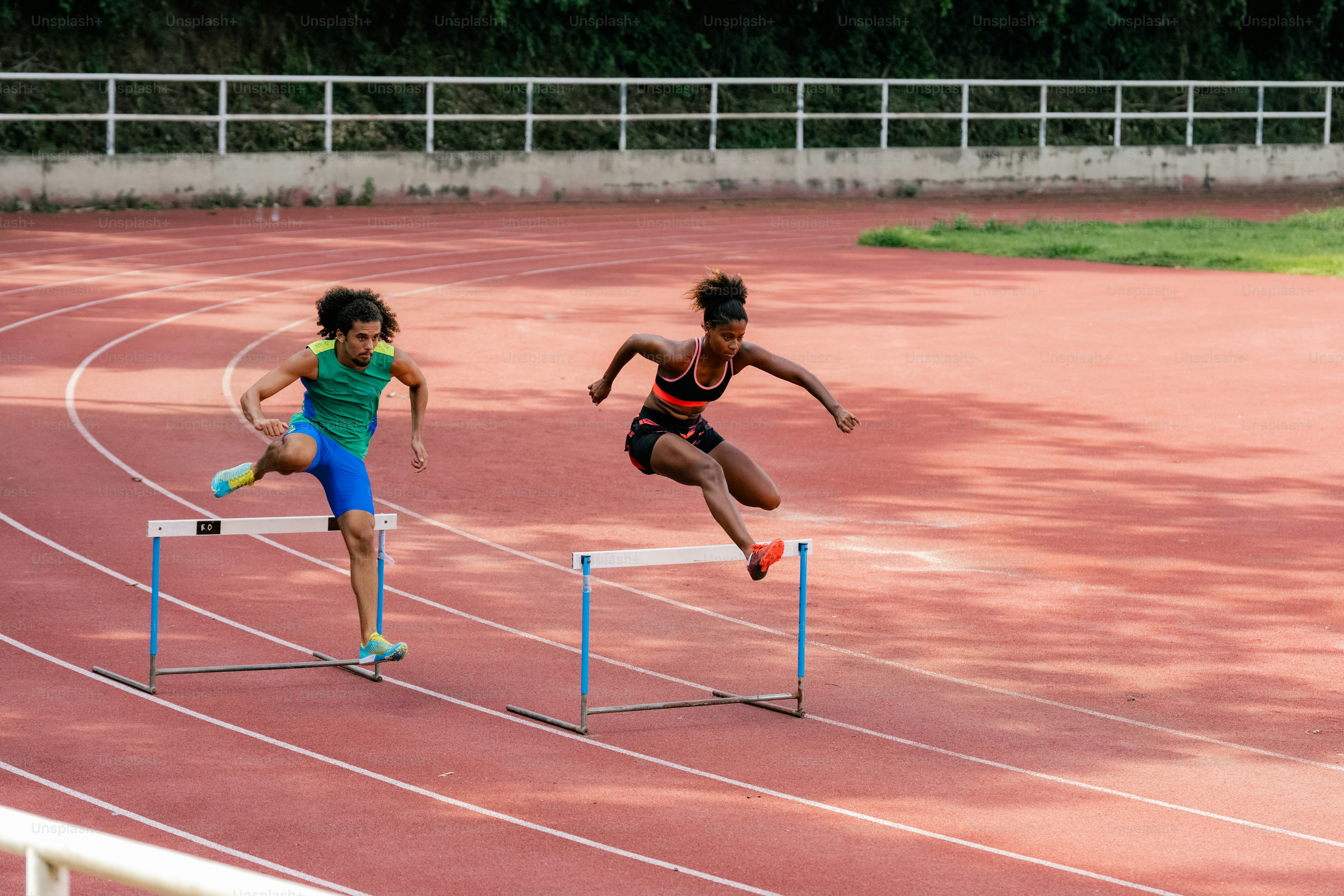 A couple of people that are on a track