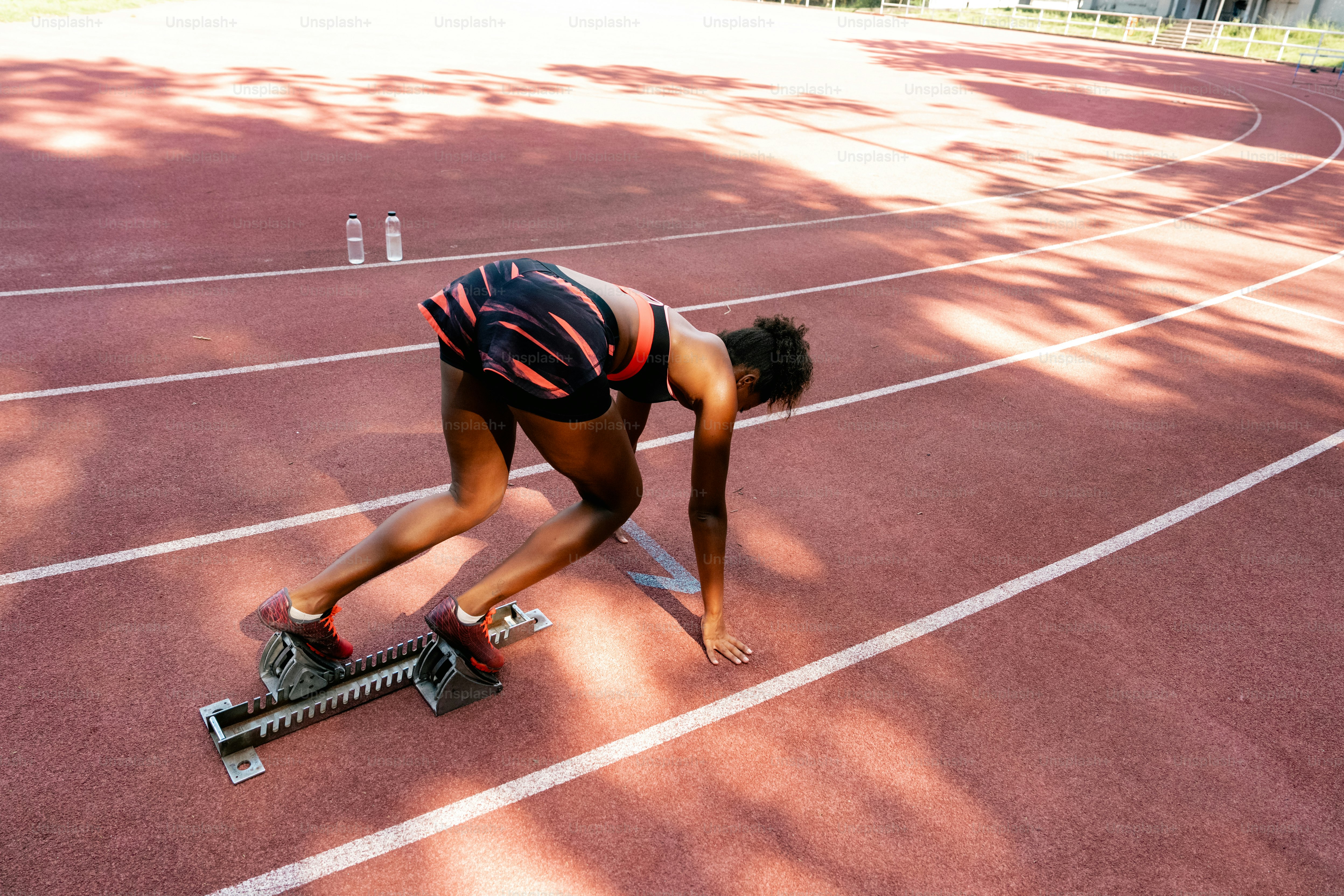 A person on a track with a skateboard