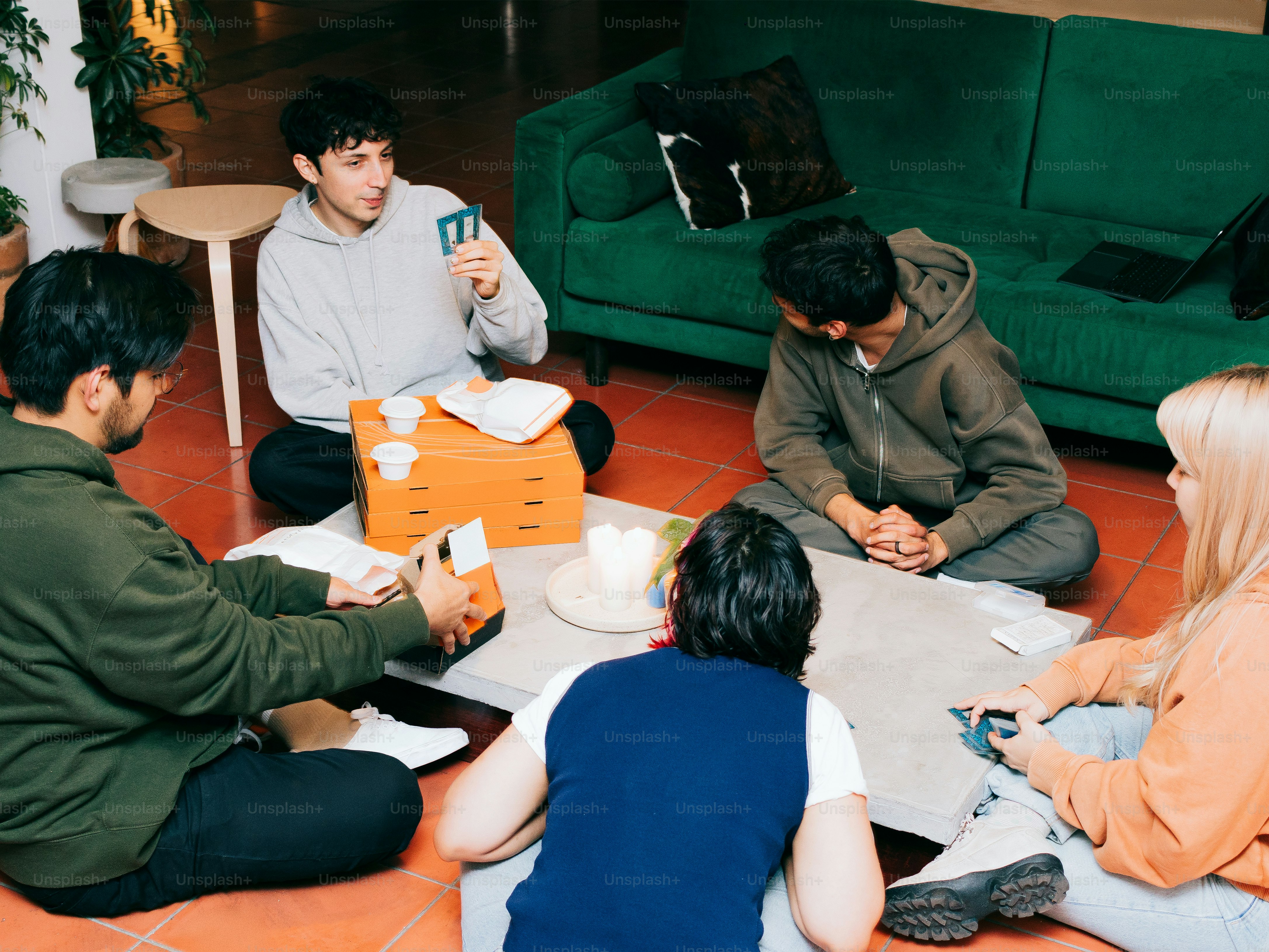 A group of people sitting around a table