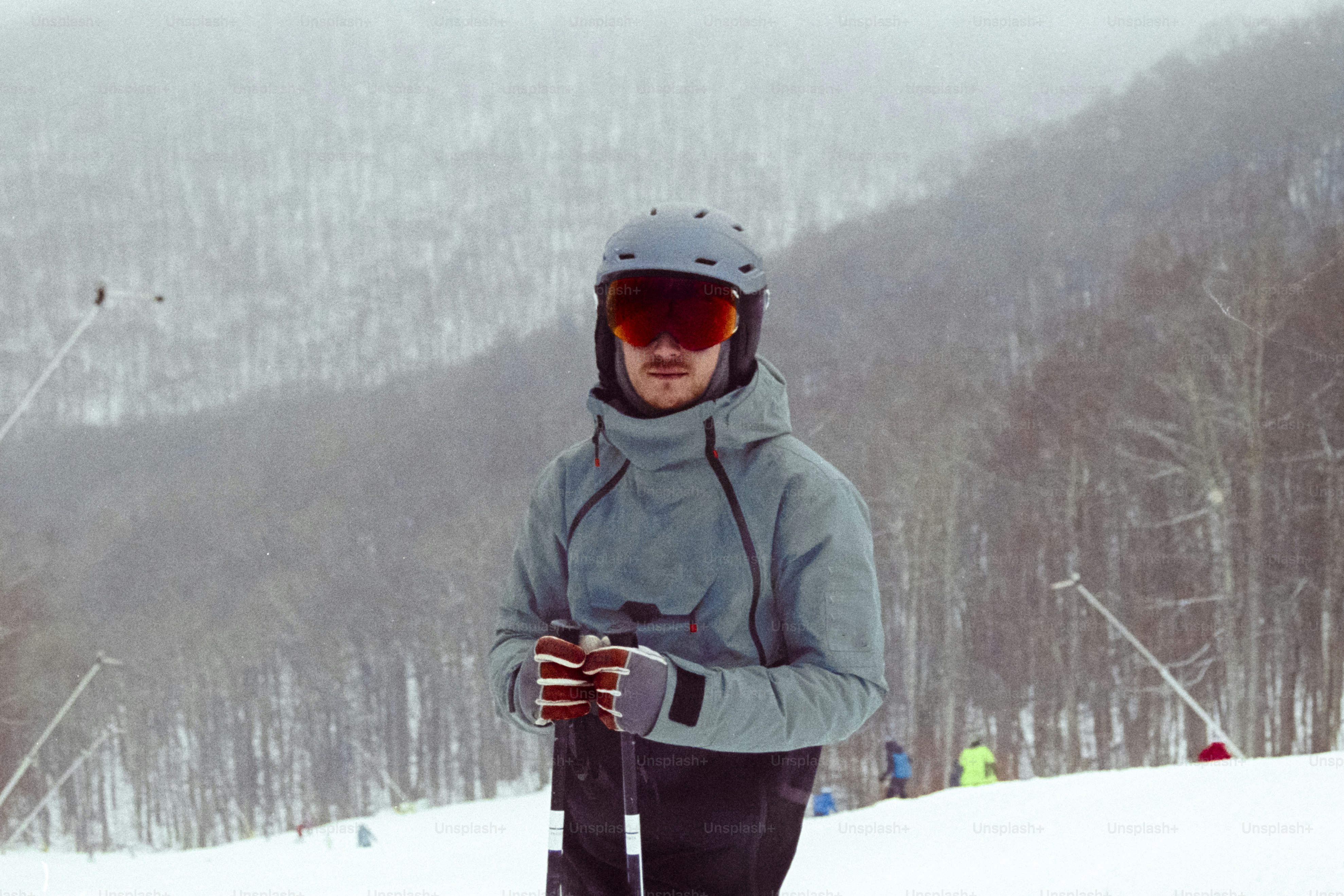 A person standing on skis in the snow