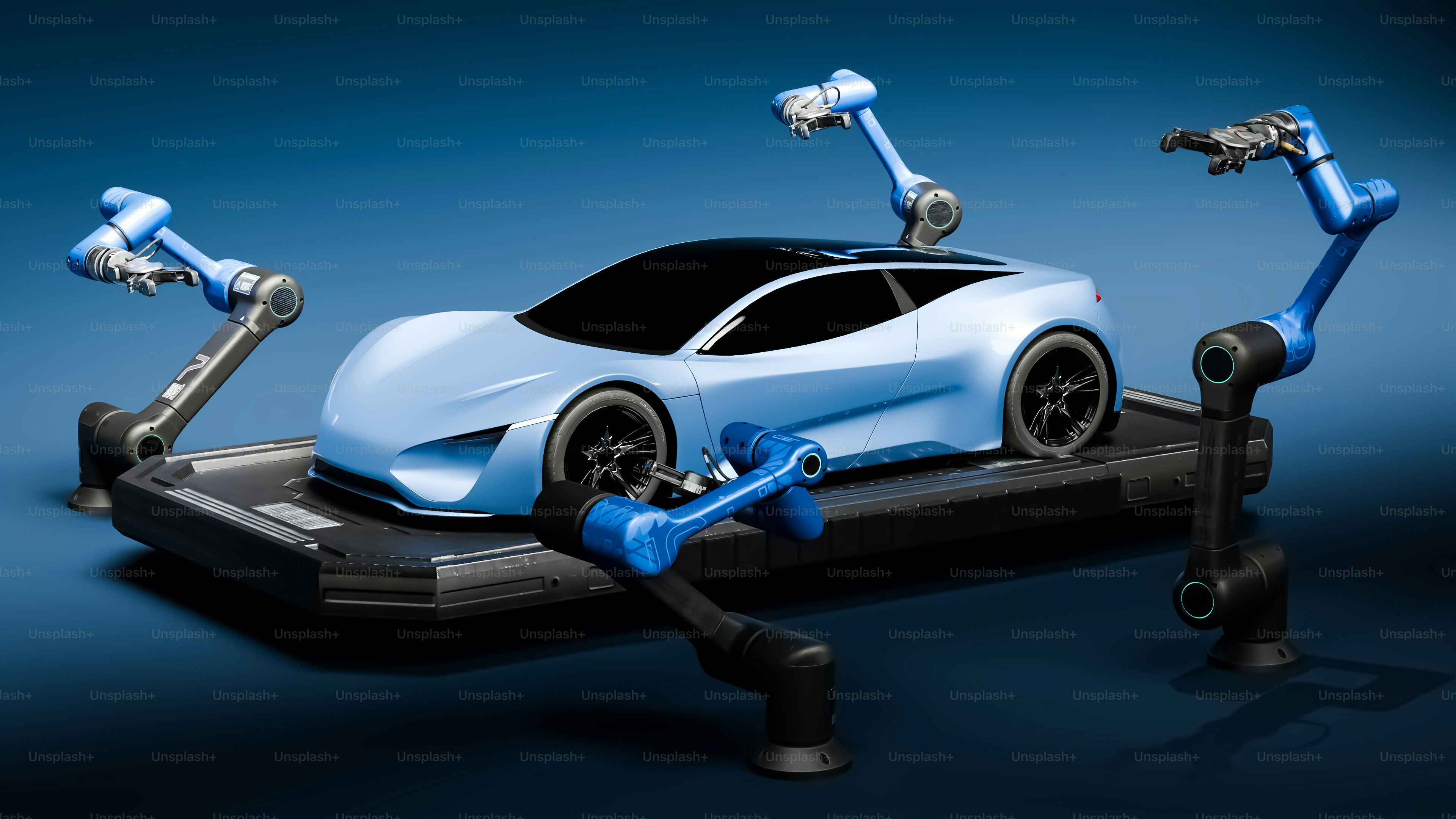 A blue car is on a black platform