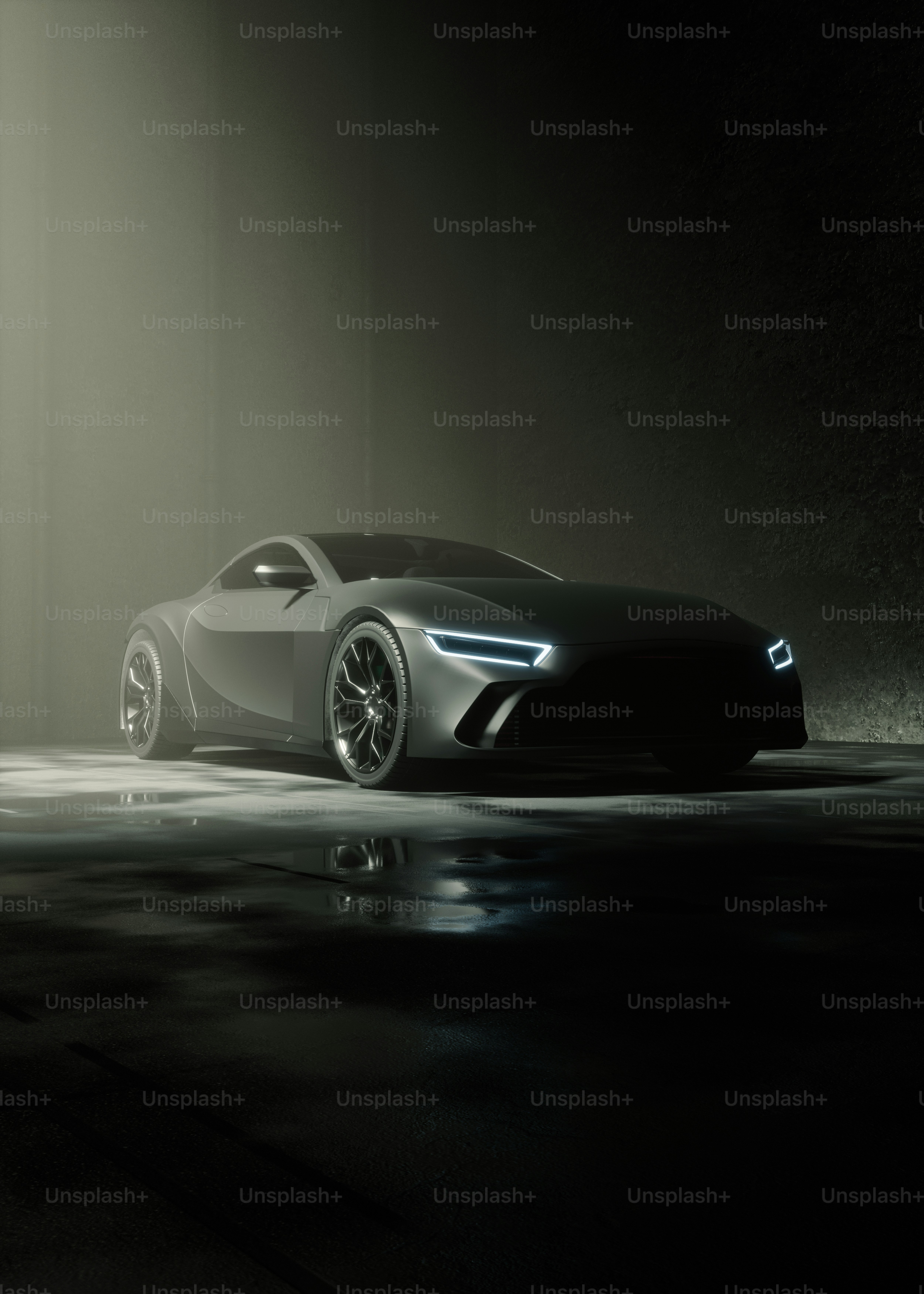 In einer Dunkelkammer wird ein futuristisches Auto gezeigt