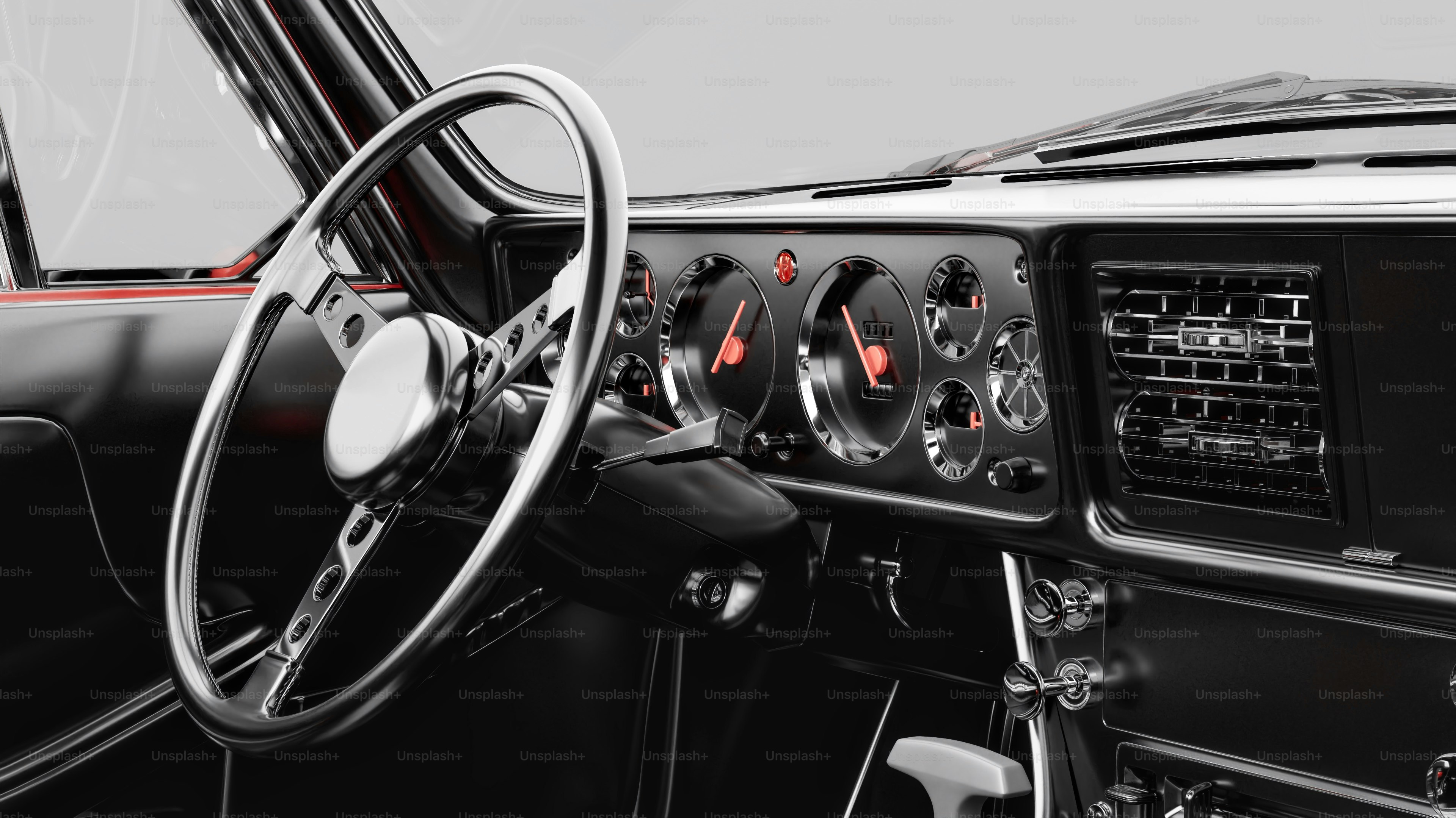 A black and white photo of a car dashboard