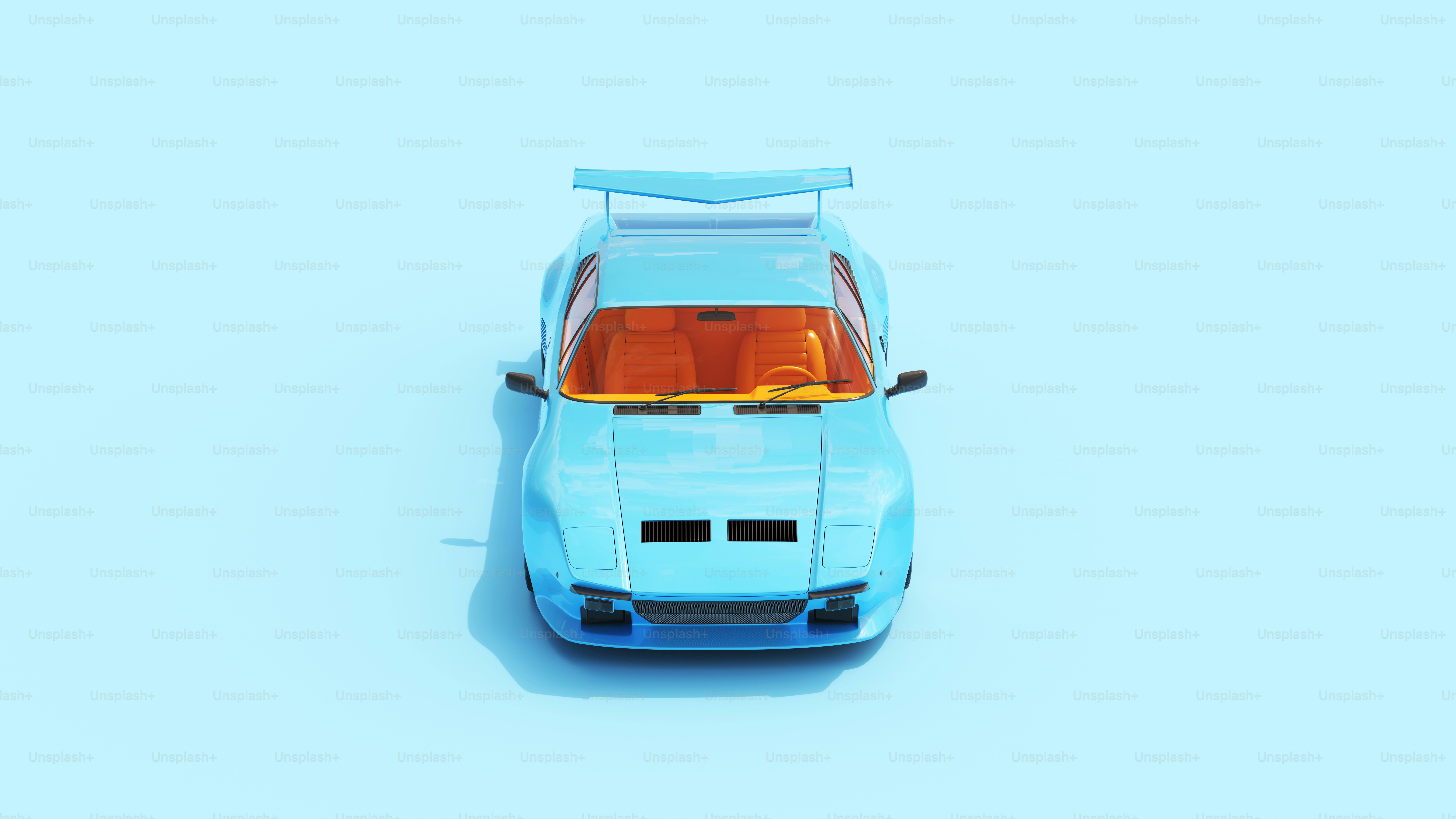 A blue toy car on a blue background