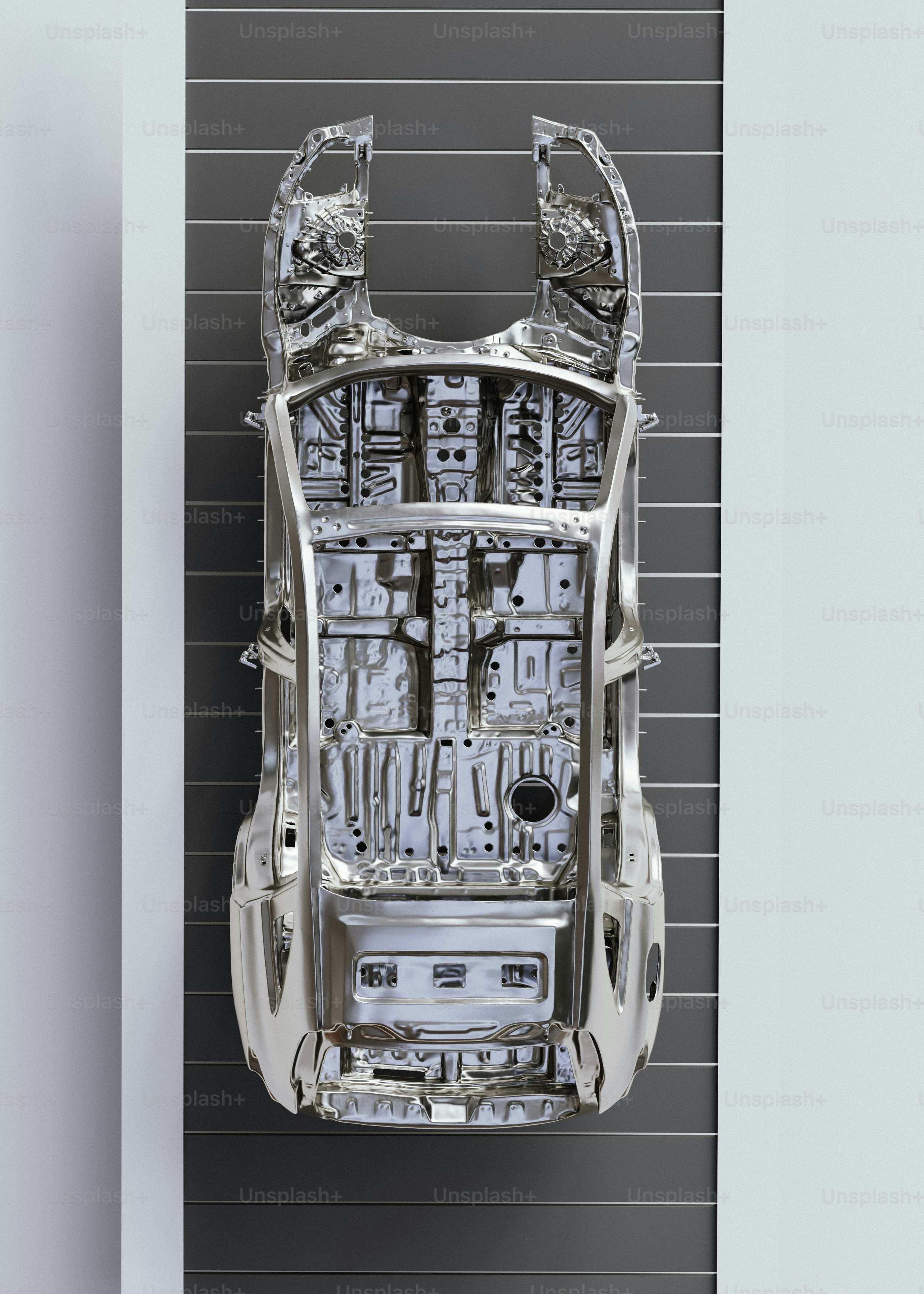 An overhead view of a car in a garage