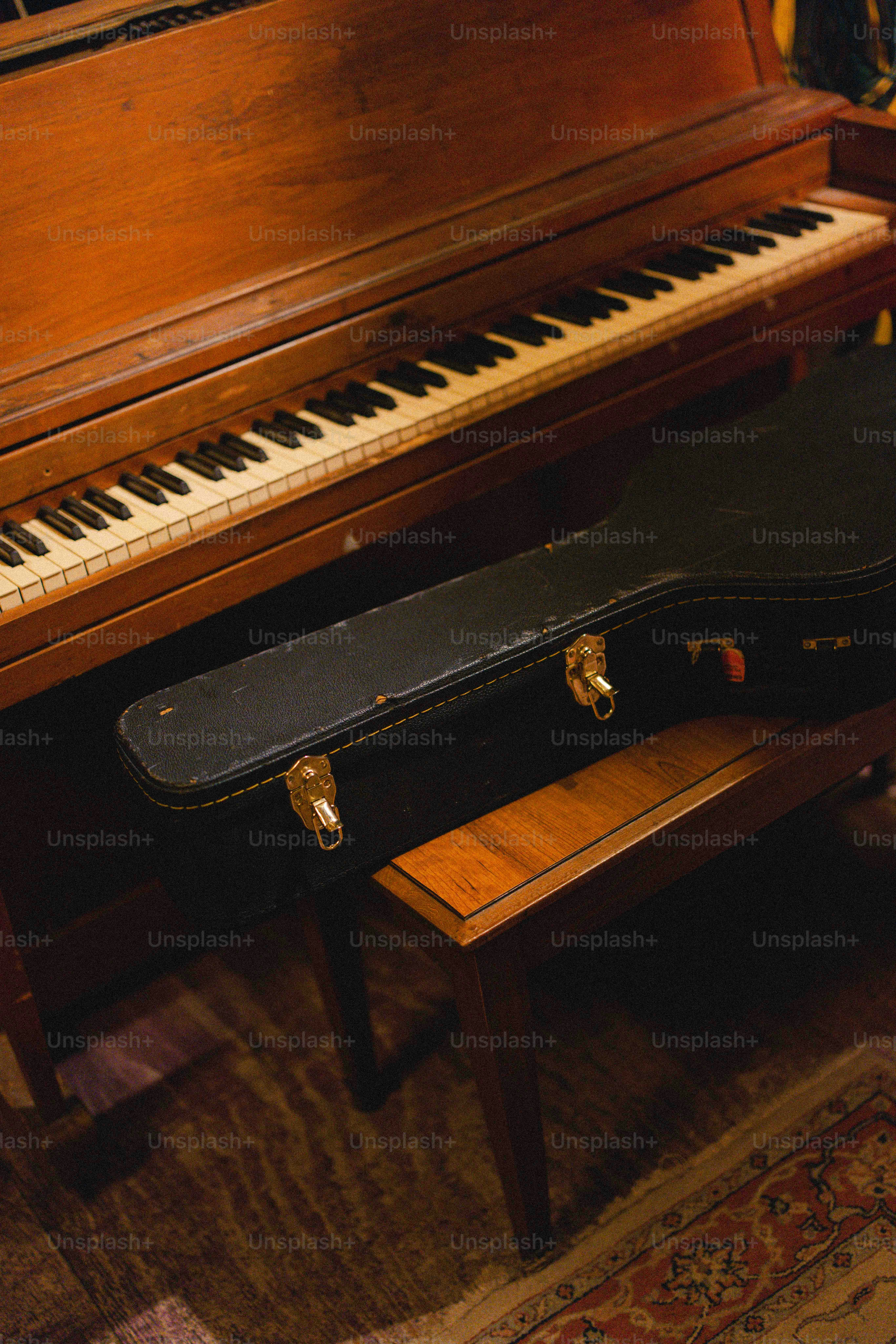 A piano and a bench in a room