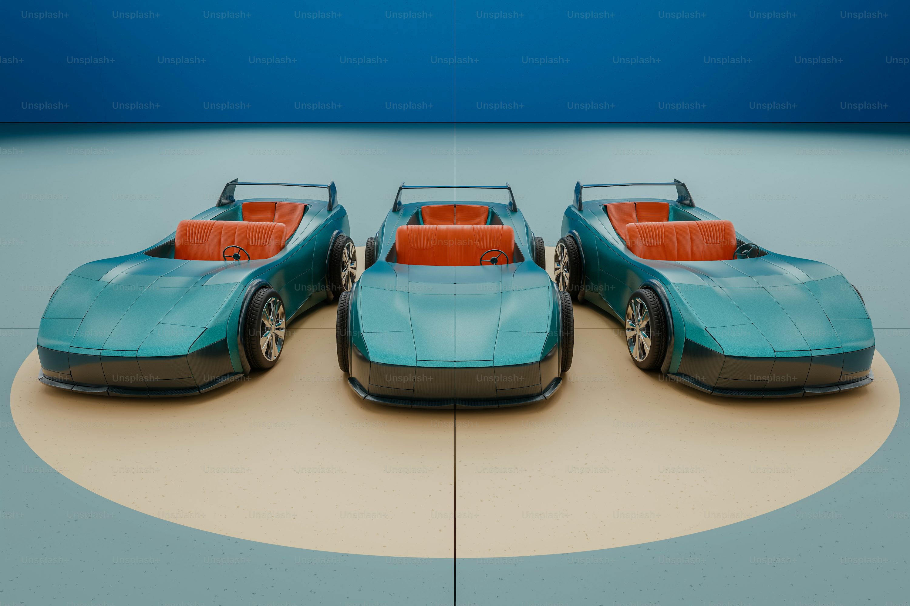 A group of three toy cars sitting on top of a table