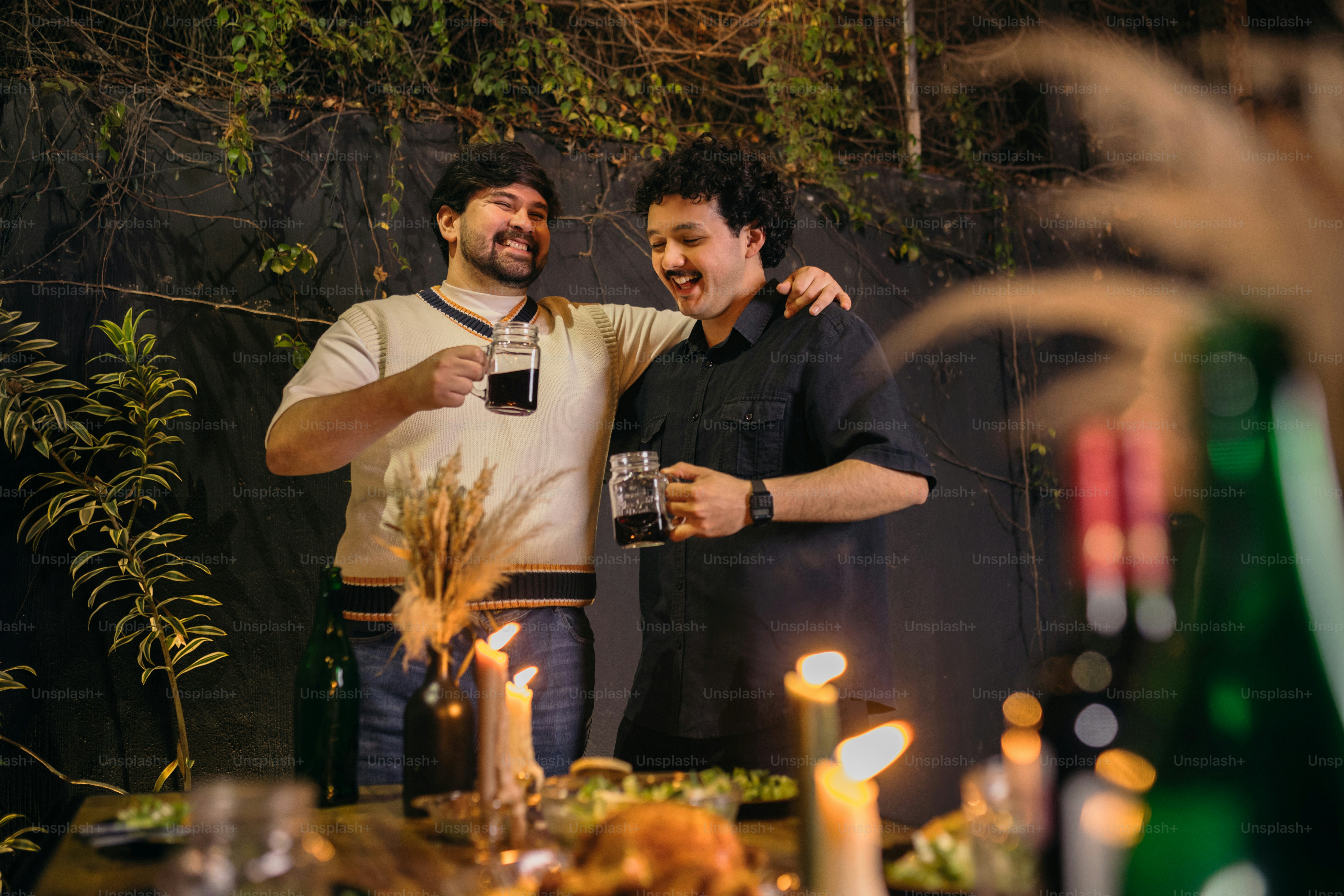 A couple of men standing next to each other