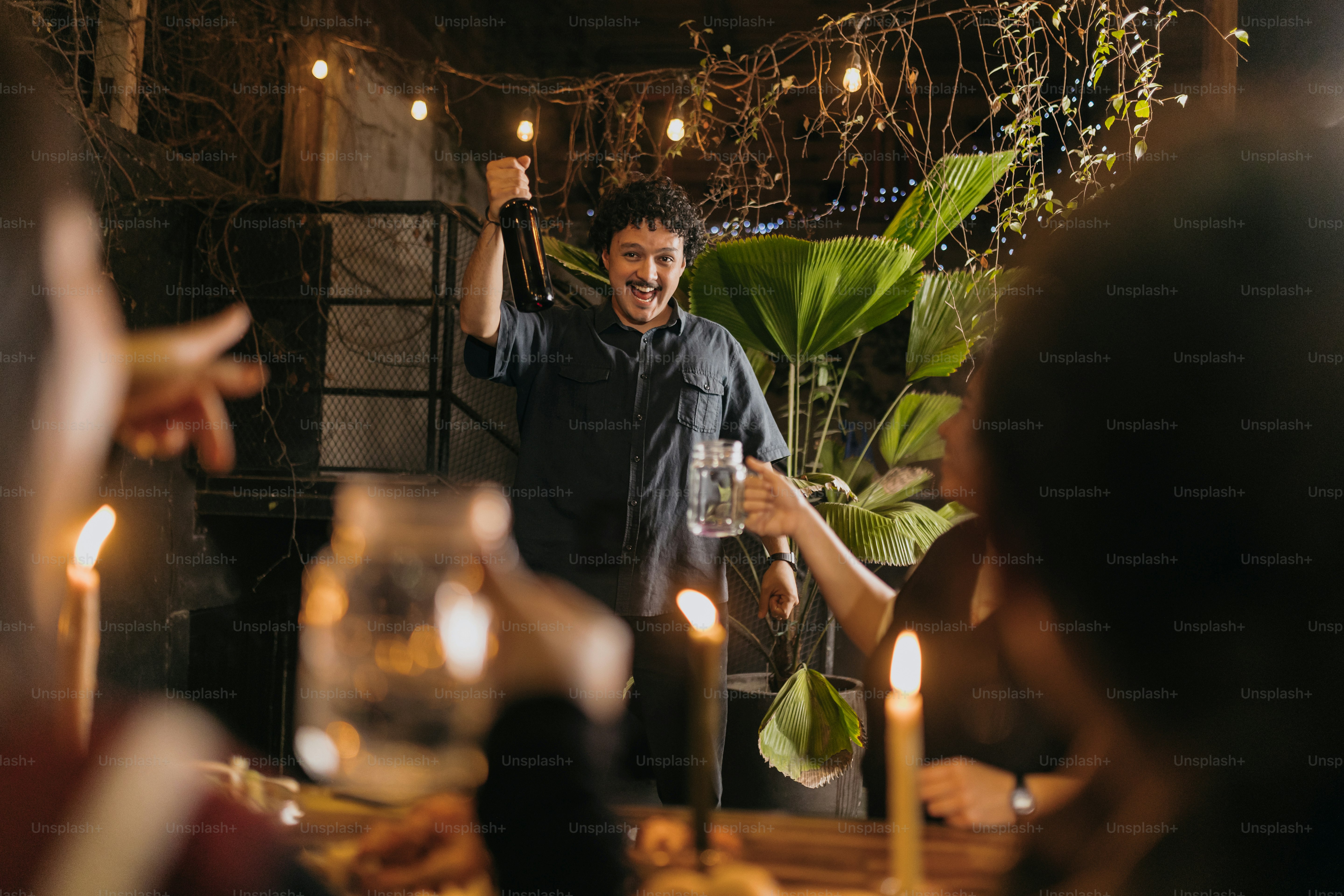 A group of people sitting around a dinner table