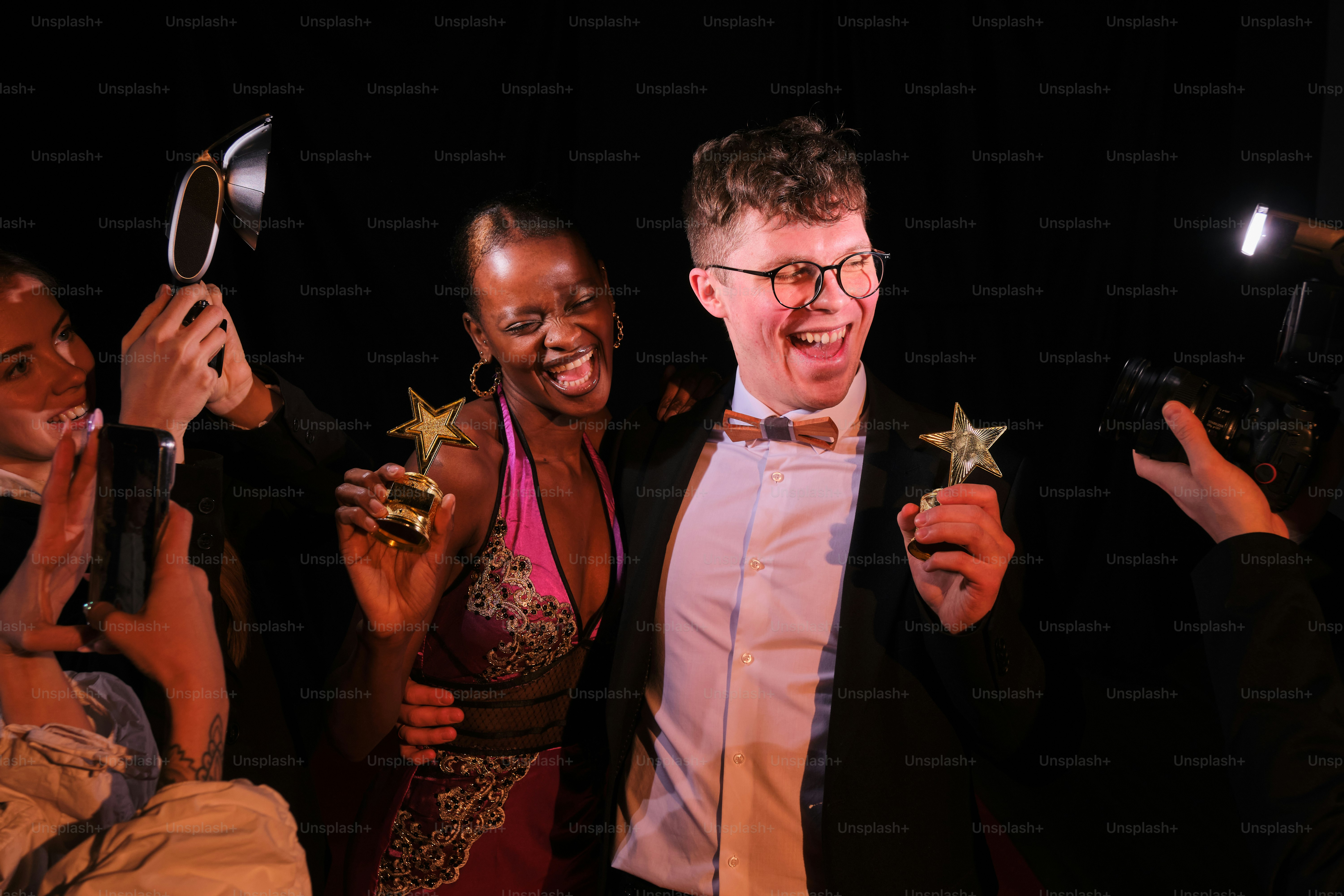 A group of people standing around each other