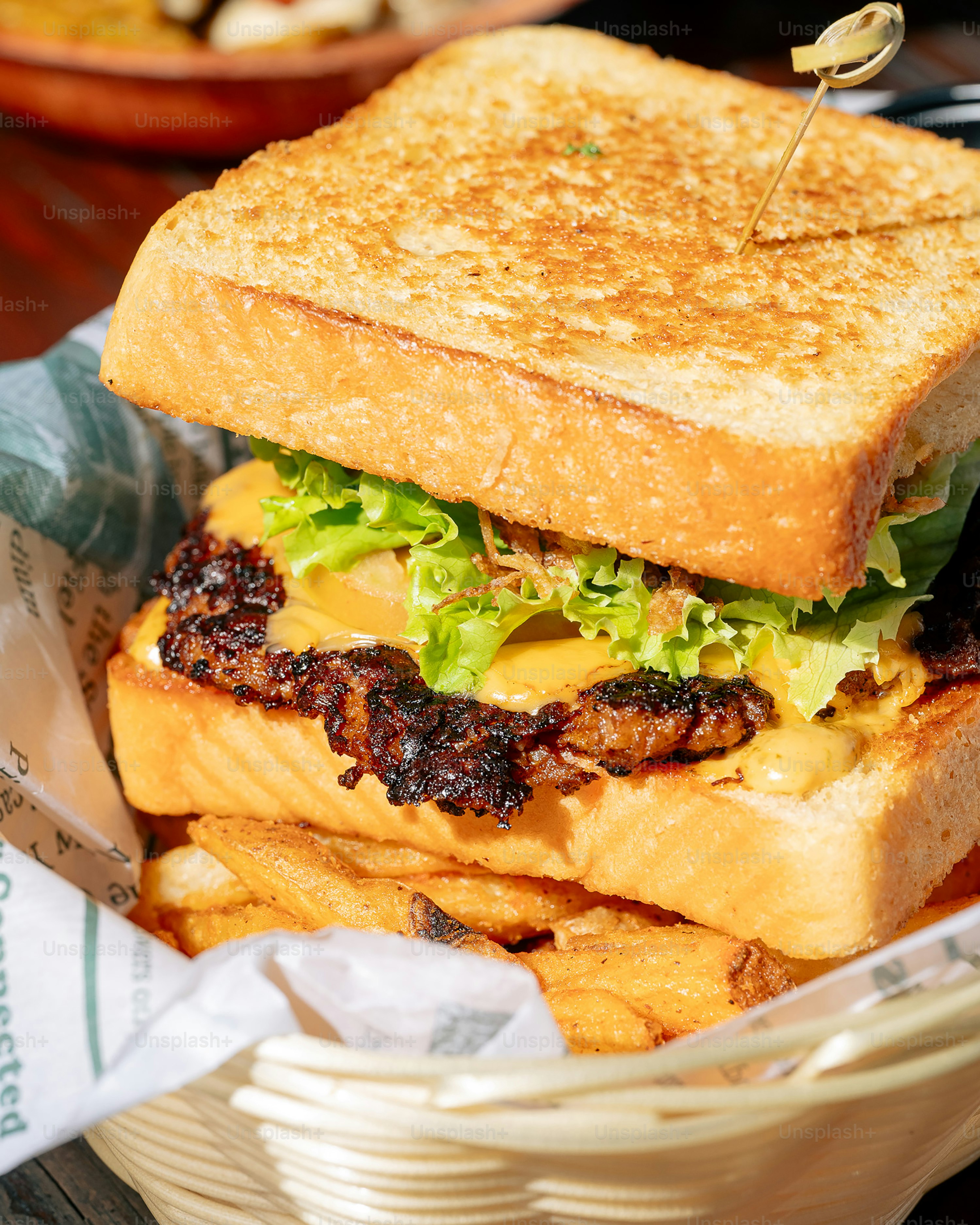 A sandwich in a basket on a table