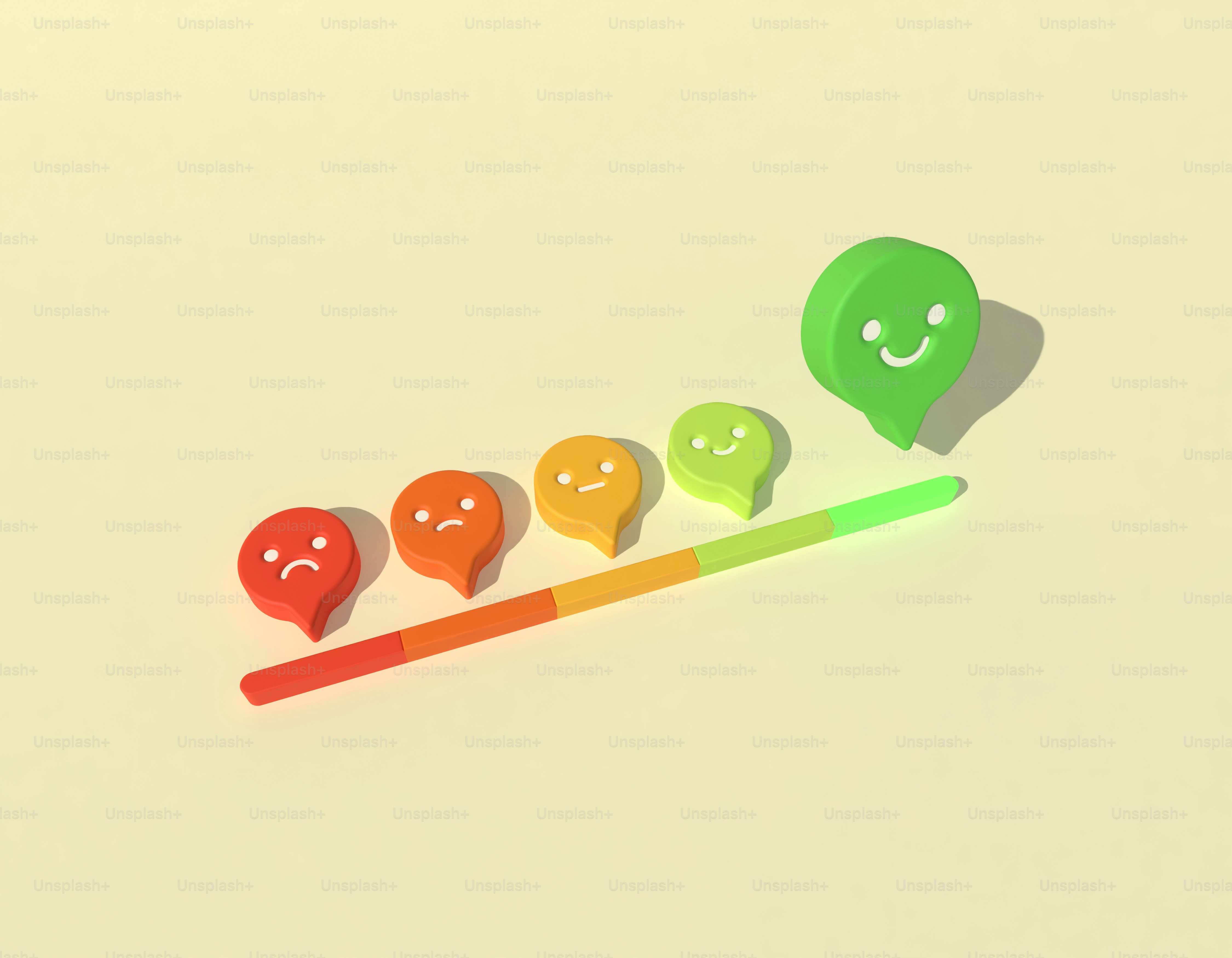 A group of three different colored stick with a smiley face on it