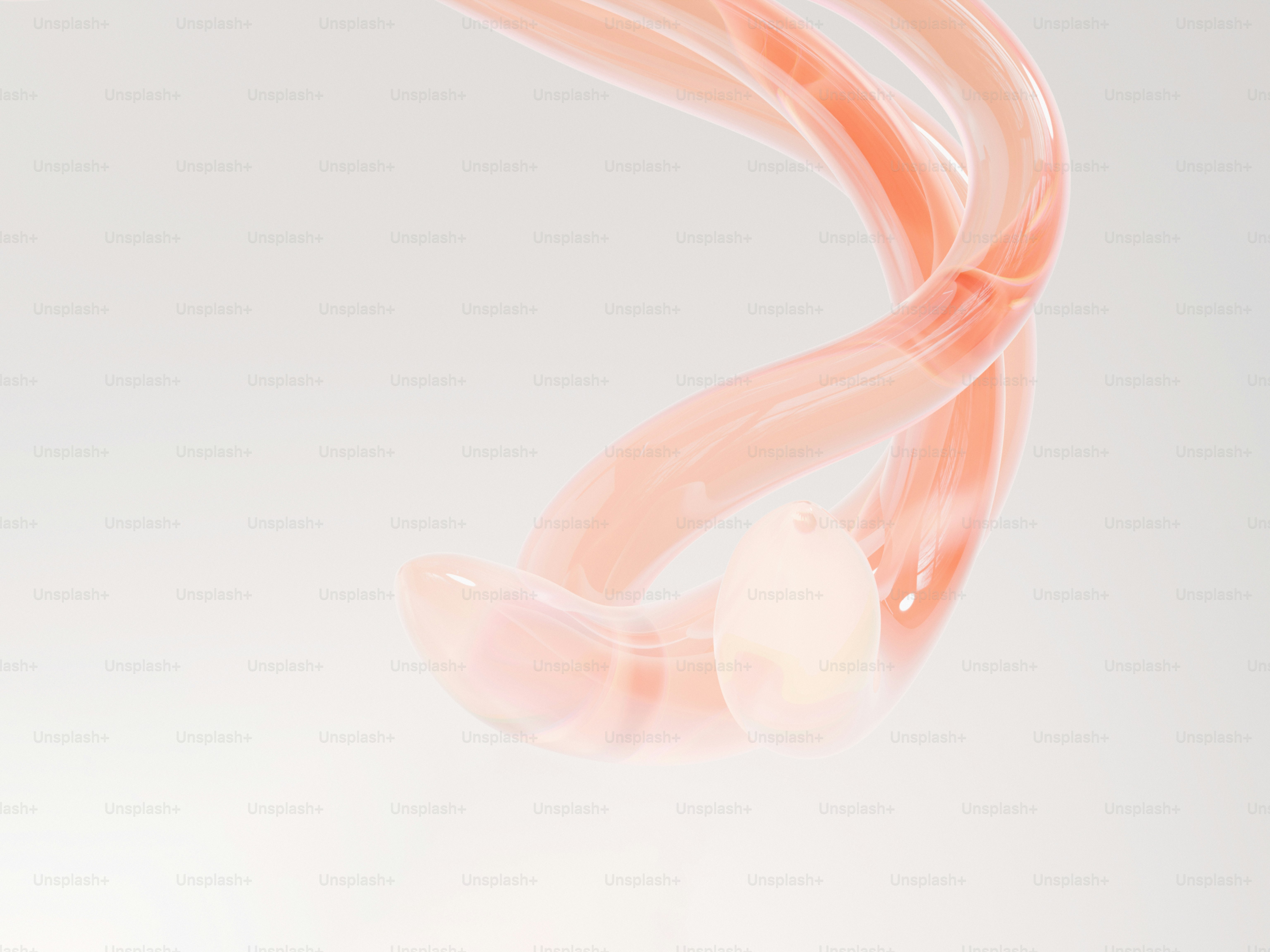 A close up of a pair of ear buds on a white background