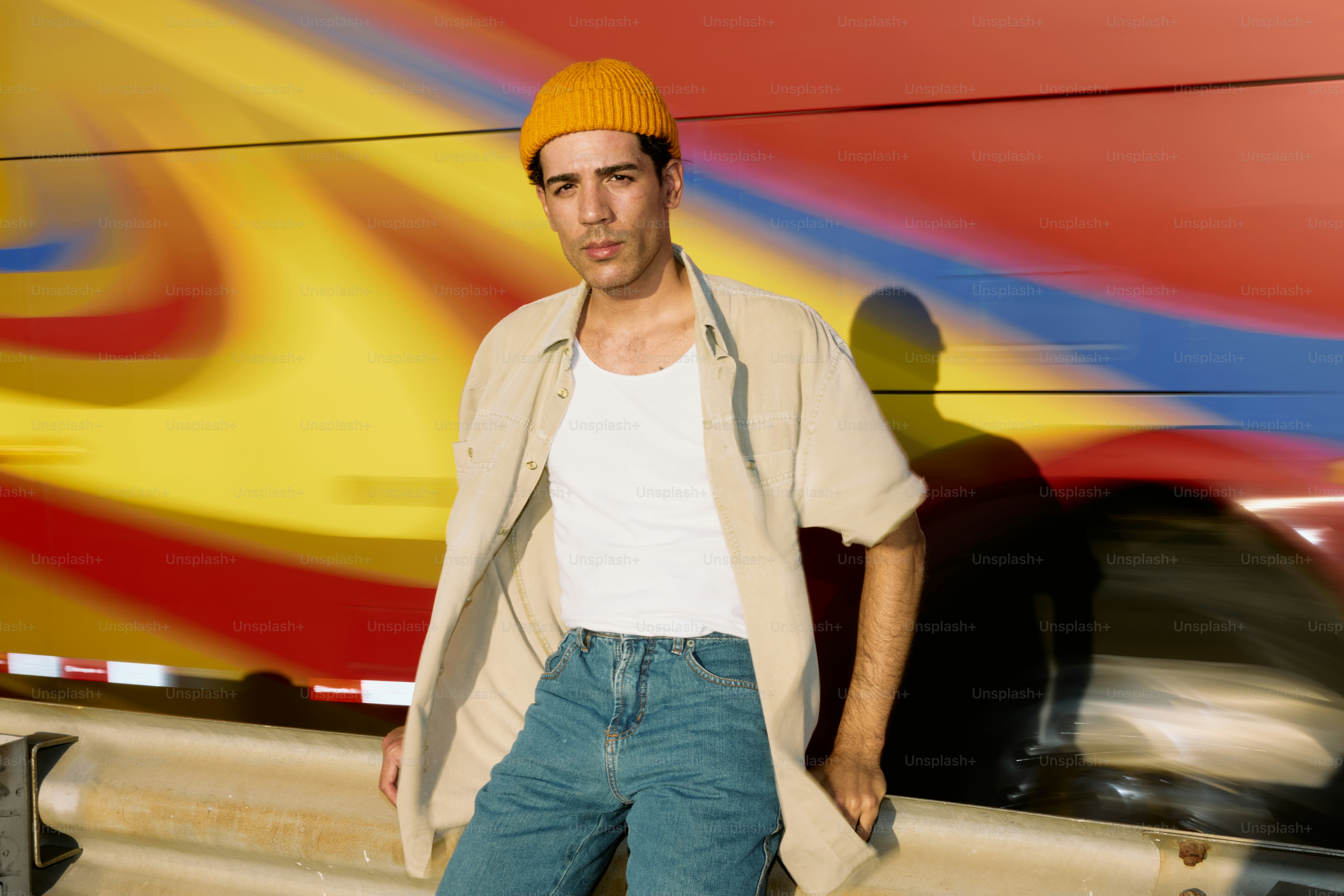 A man standing in front of a truck