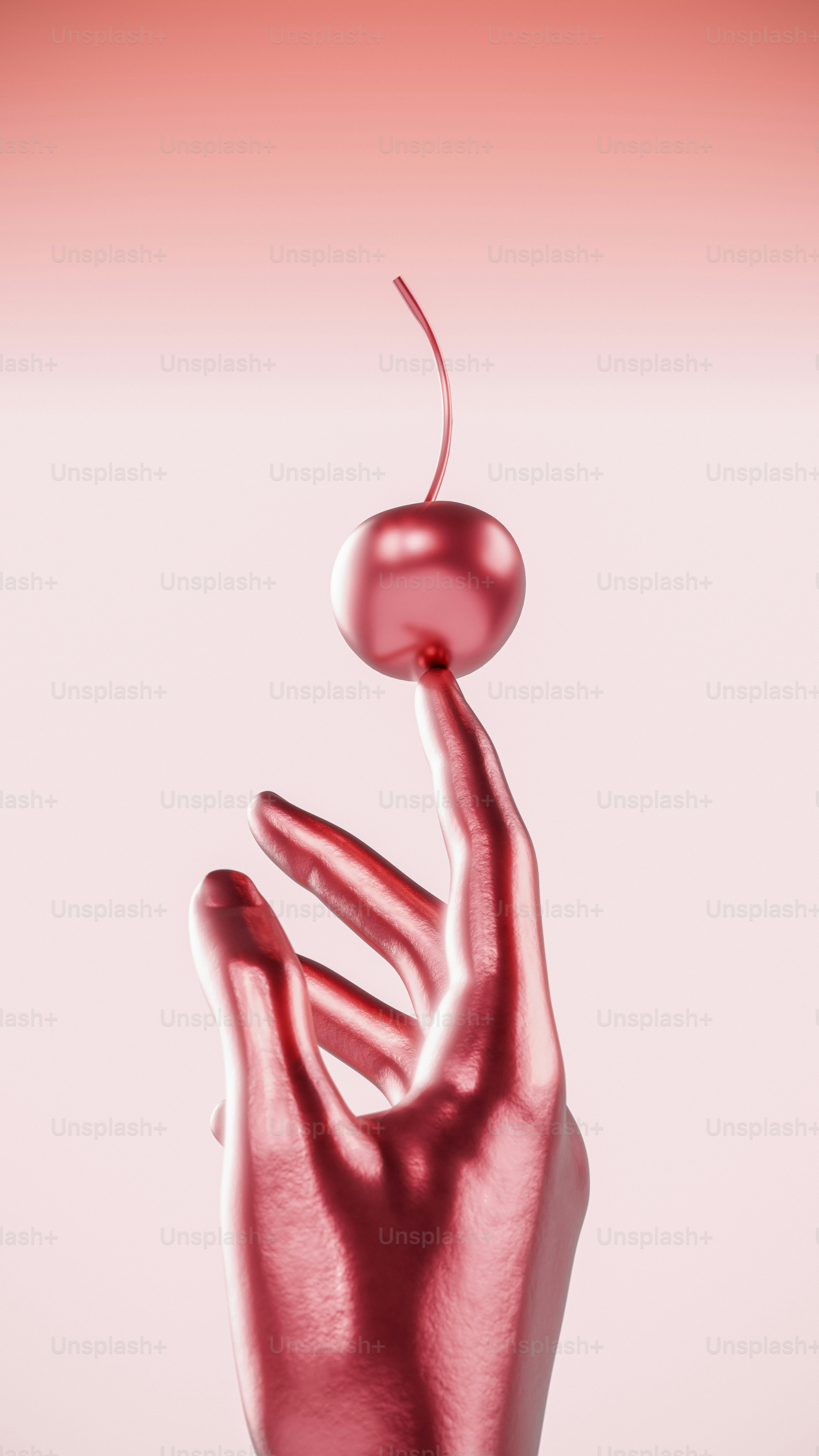 A hand with a cherry on top of it