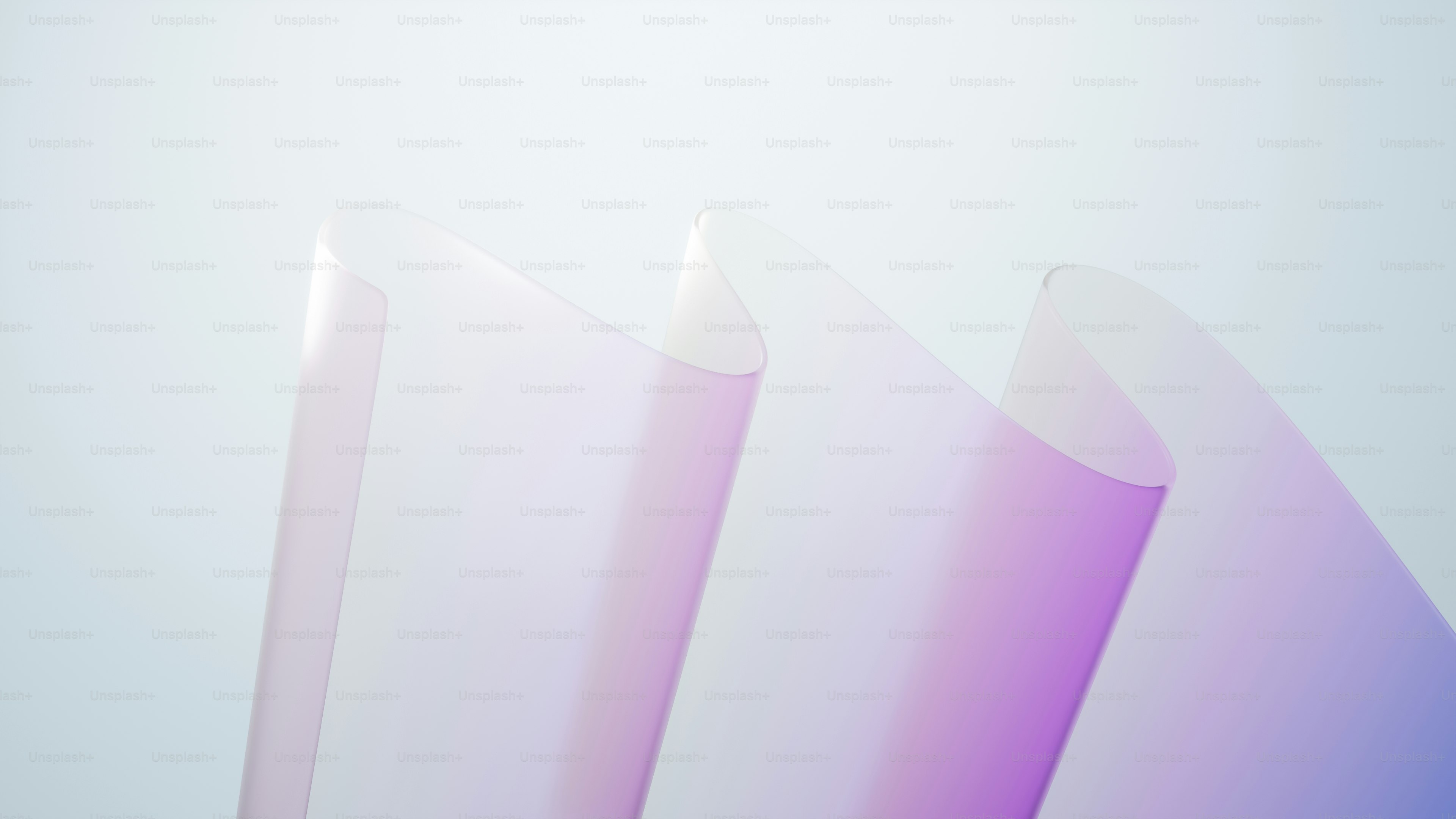 A blurry photo of three candles on a table