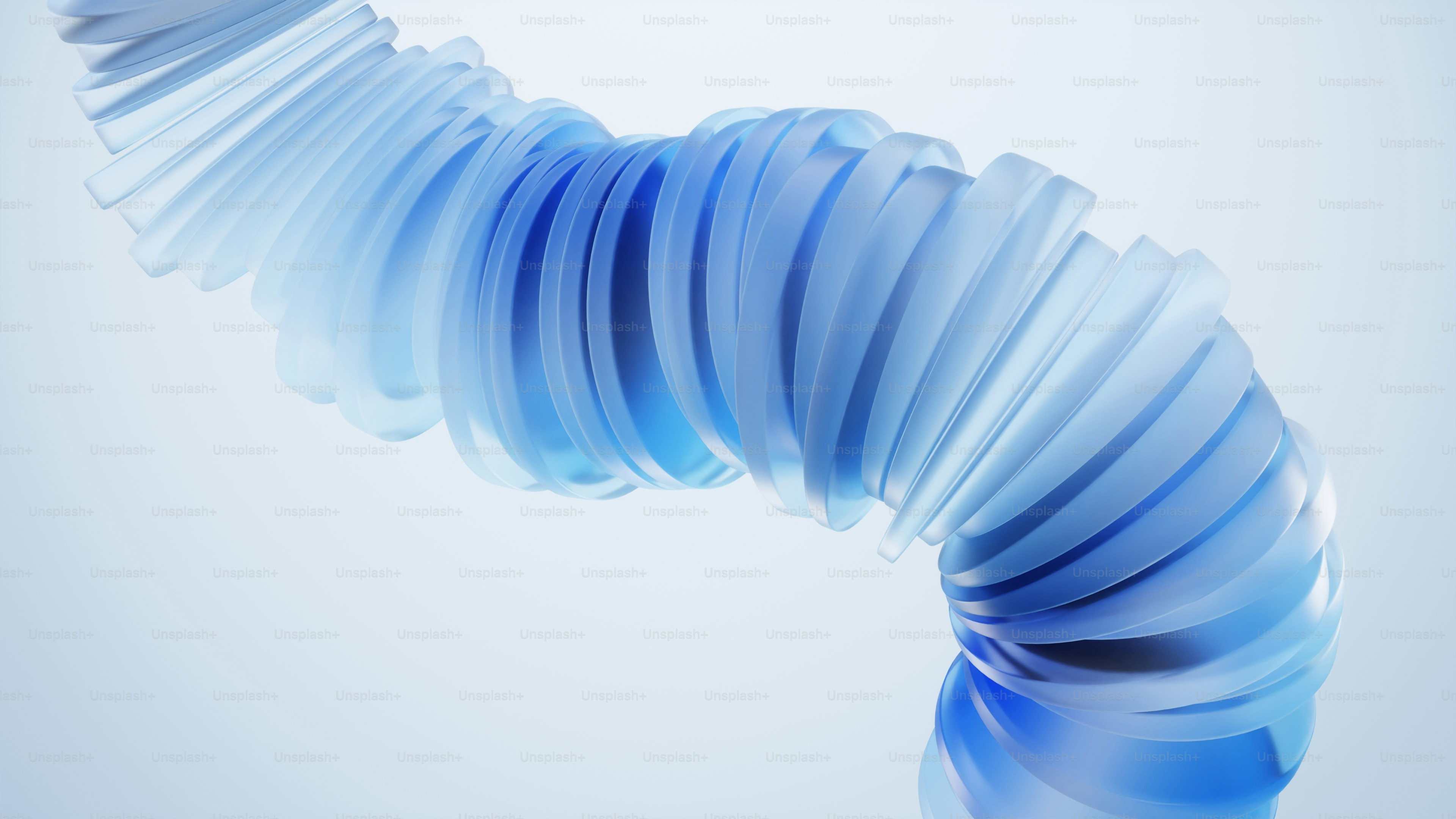 A blue spiral shaped object on a white background